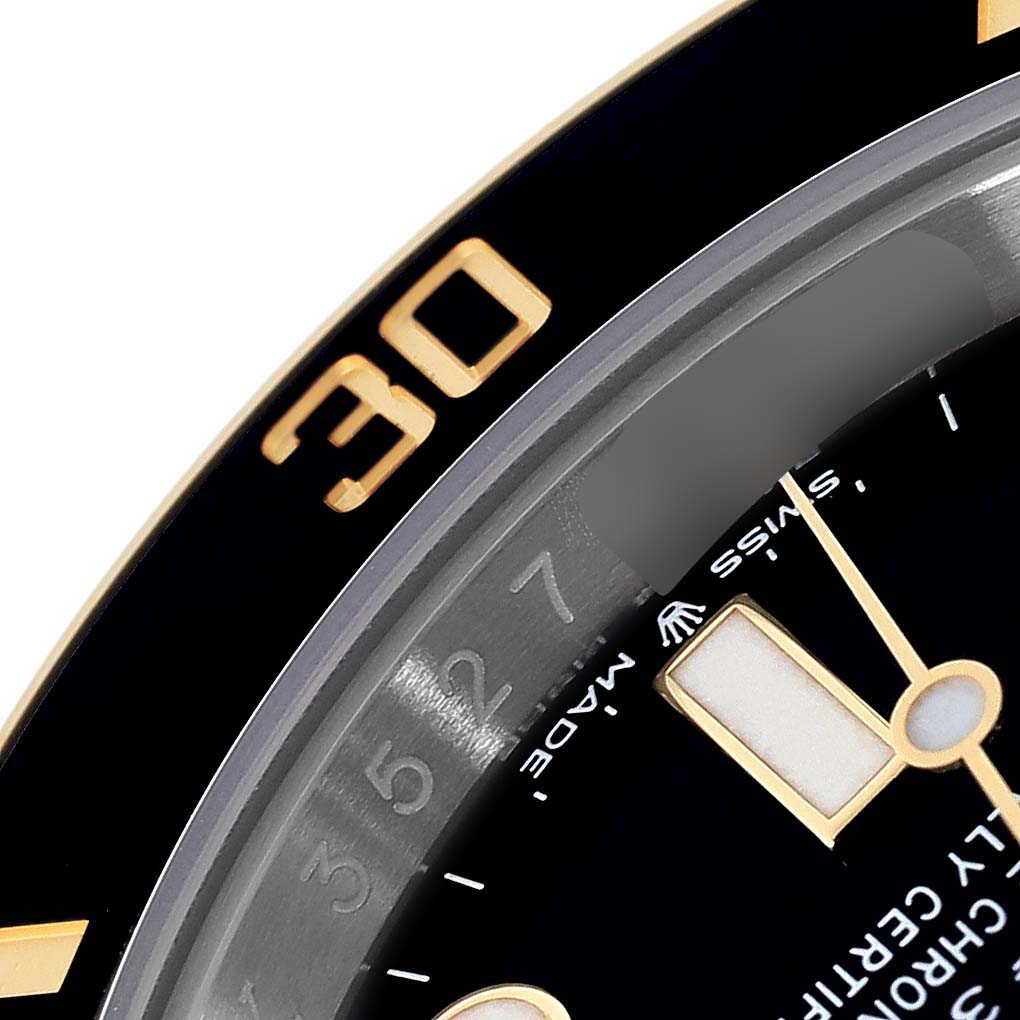 The image shows a close-up of the bezel and dial of a Rolex Submariner 126613LN Men's Steel and Gold (two tone) Black Dial 126613LN Men's Steel and Gold (two tone) Black Dial, highlighting the "30" marker.