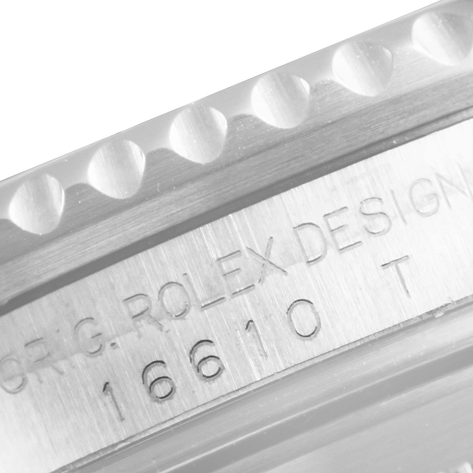 This close-up image shows the engraved reference number on the inner bezel of the Rolex Submariner 16610 Men's Stainless Steel Black Dial 16610 Men's Stainless Steel Black Dial watch.