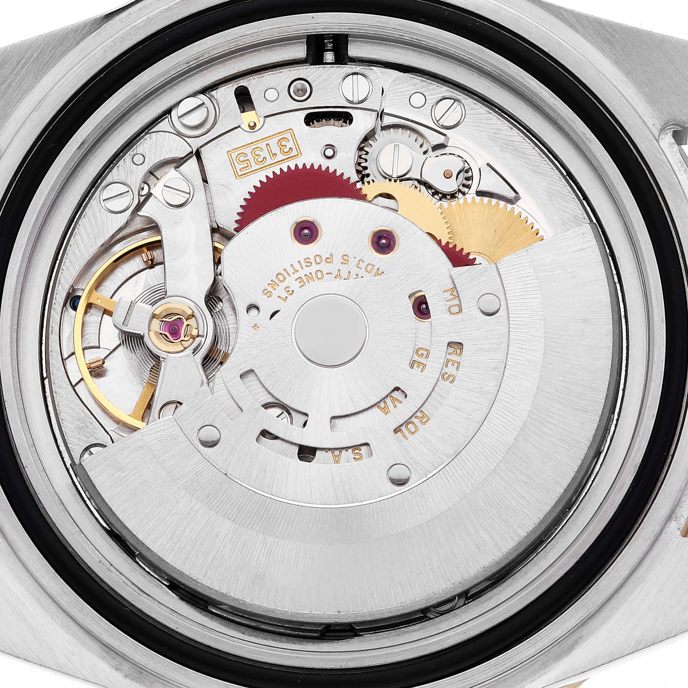 This image shows the internal mechanical movement of a Rolex Submariner 16613 Men's Steel and Gold (two tone) Blue Dial 16613 Men's Steel and Gold (two tone) Blue Dial watch from a close-up, rear-facing angle.