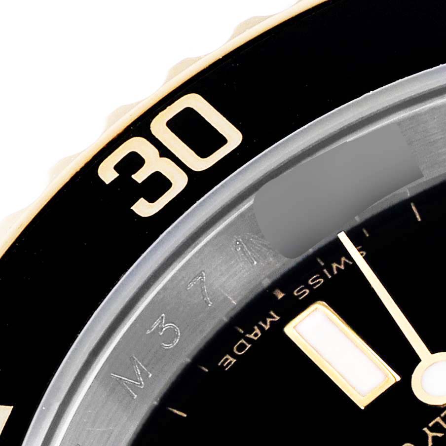 The image shows a close-up of the bezel and part of the dial of a Rolex Submariner 16613 Men's Steel and Gold (two tone) Black Dial 16613 Men's Steel and Gold (two tone) Black Dial watch, focusing on the "30" marking.