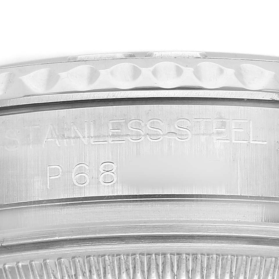 The image shows a close-up of the Rolex Yacht-Master 168622 Men's Stainless Steel Silver Dial's stainless steel engraving on the watch's rim.