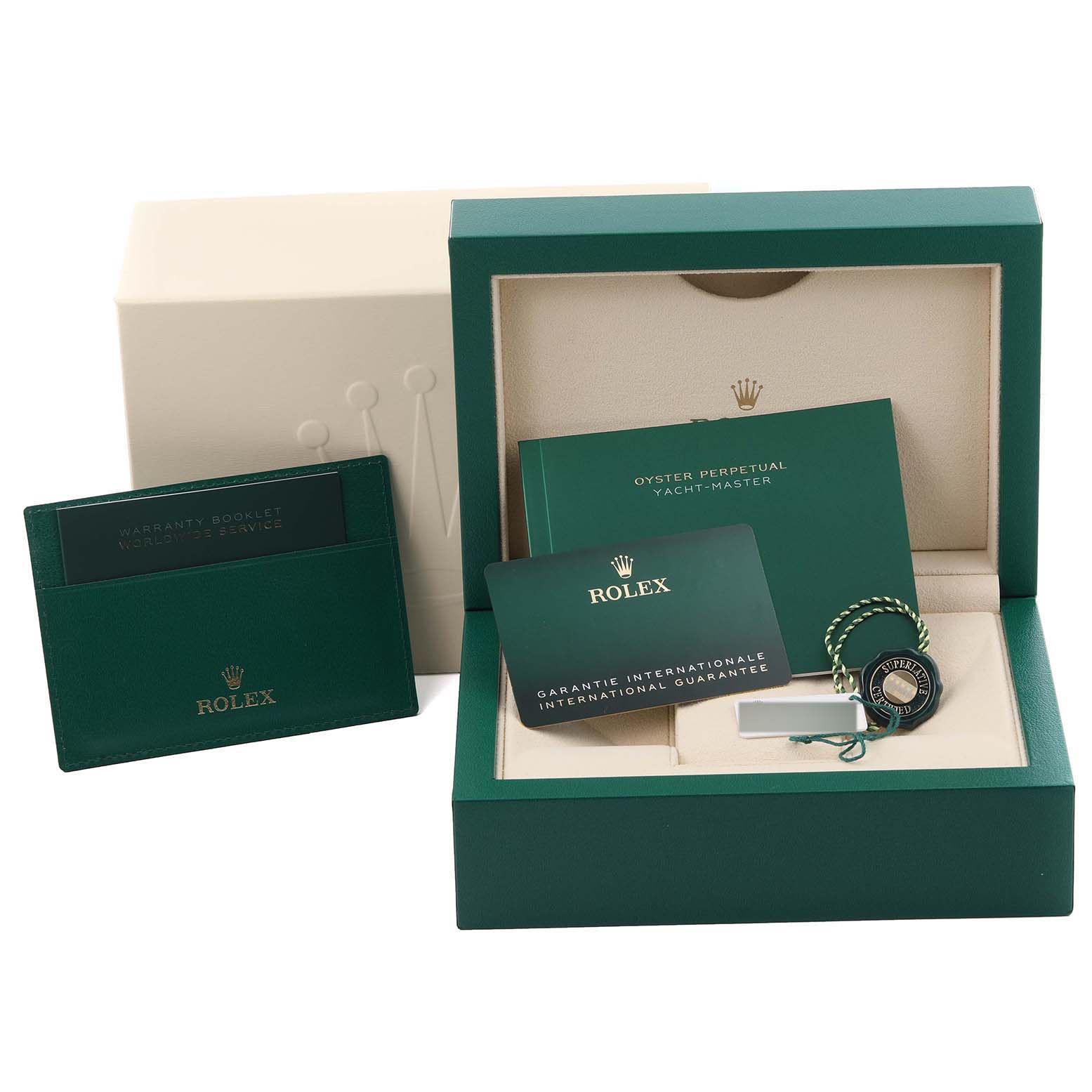 The image shows a Rolex Yacht-Master 126621 Men's Steel and Gold (two tone) Brown Dial 126621 Men's Steel and Gold (two tone) Brown Dial box set, featuring the box, warranty card, booklet, and a tag.