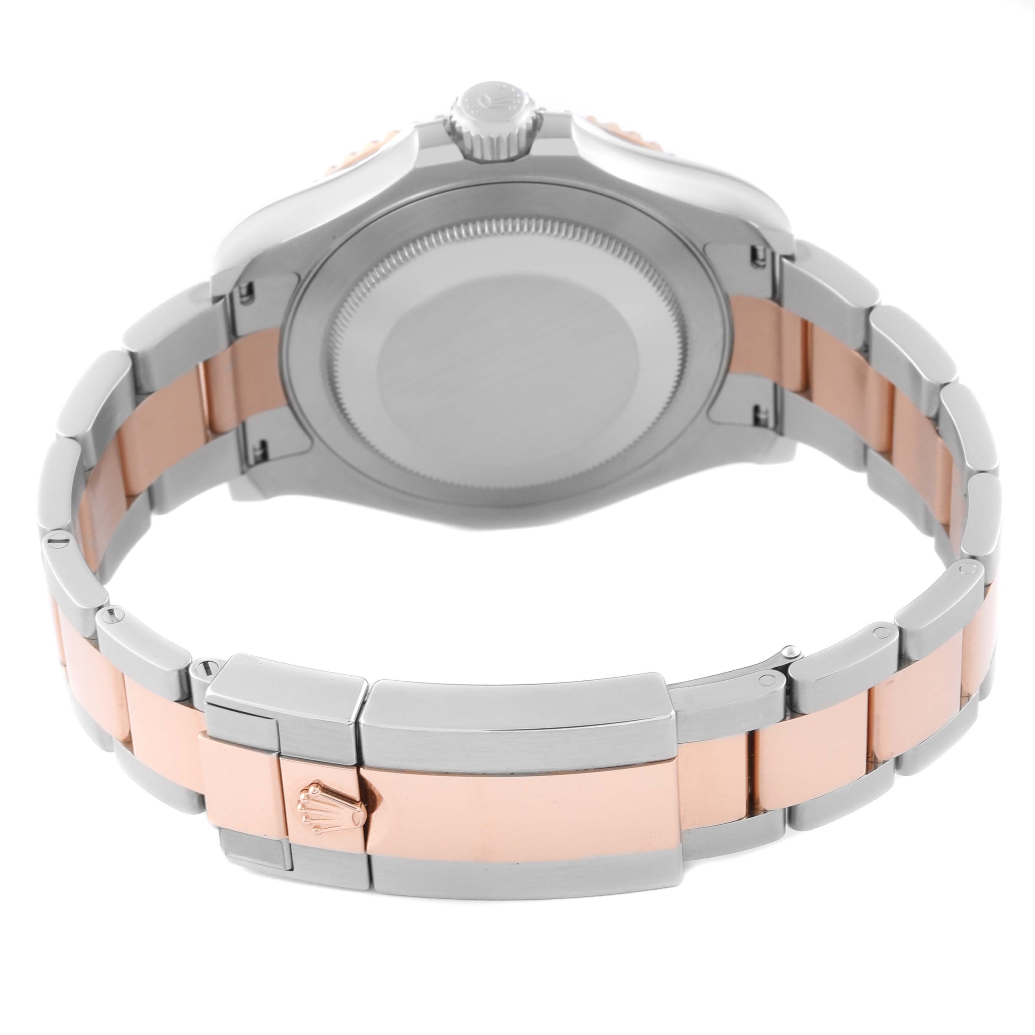 The image shows the back of the Rolex Yacht-Master 126621 Men's Steel and Gold (two tone) Brown Dial 126621 Men's Steel and Gold (two tone) Brown Dial watch, focusing on the case back and two-tone bracelet clasp.