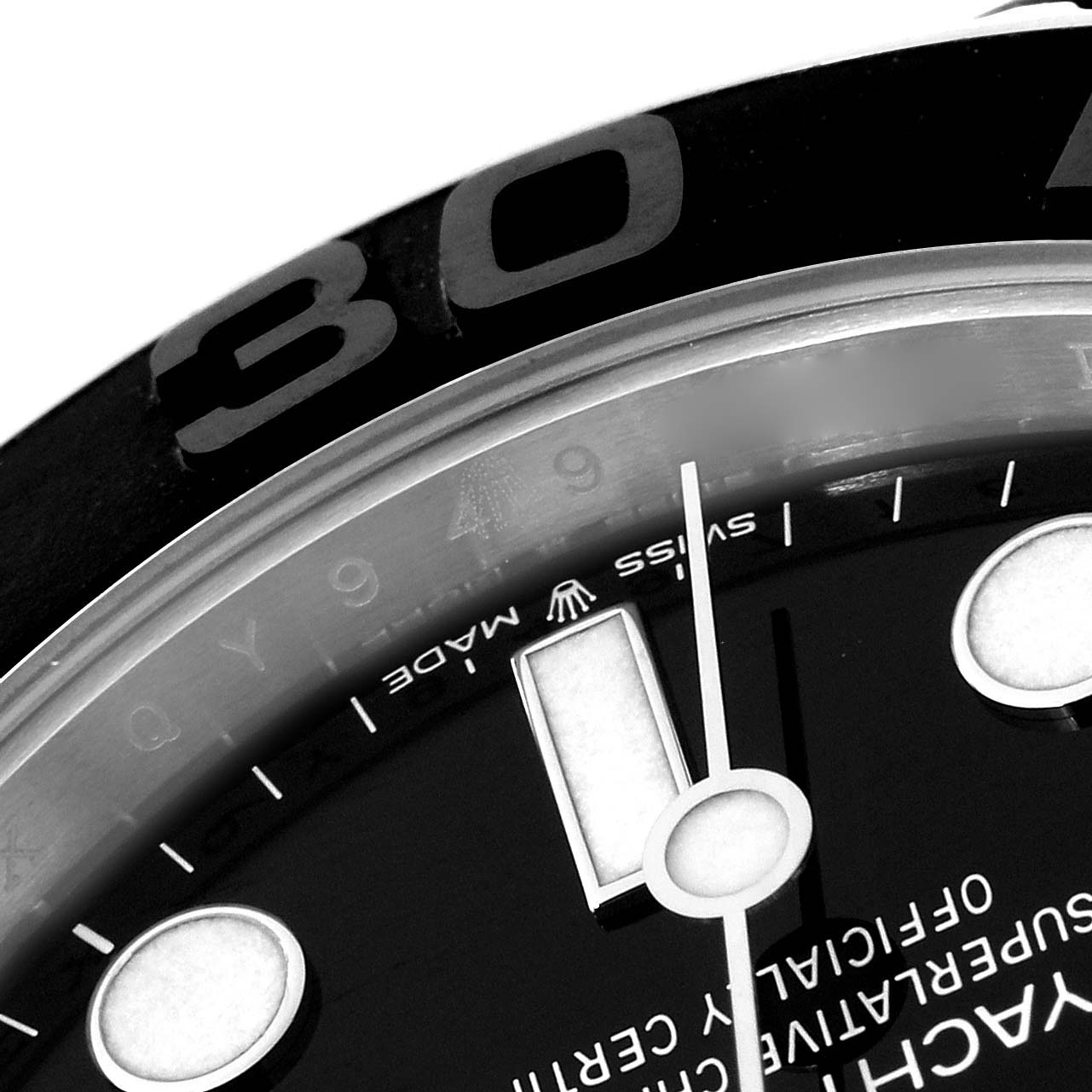 The image shows a close-up of the dial and bezel of a Rolex Yacht-Master 226659 Men's White Gold Black Dial watch, highlighting the markers and text.