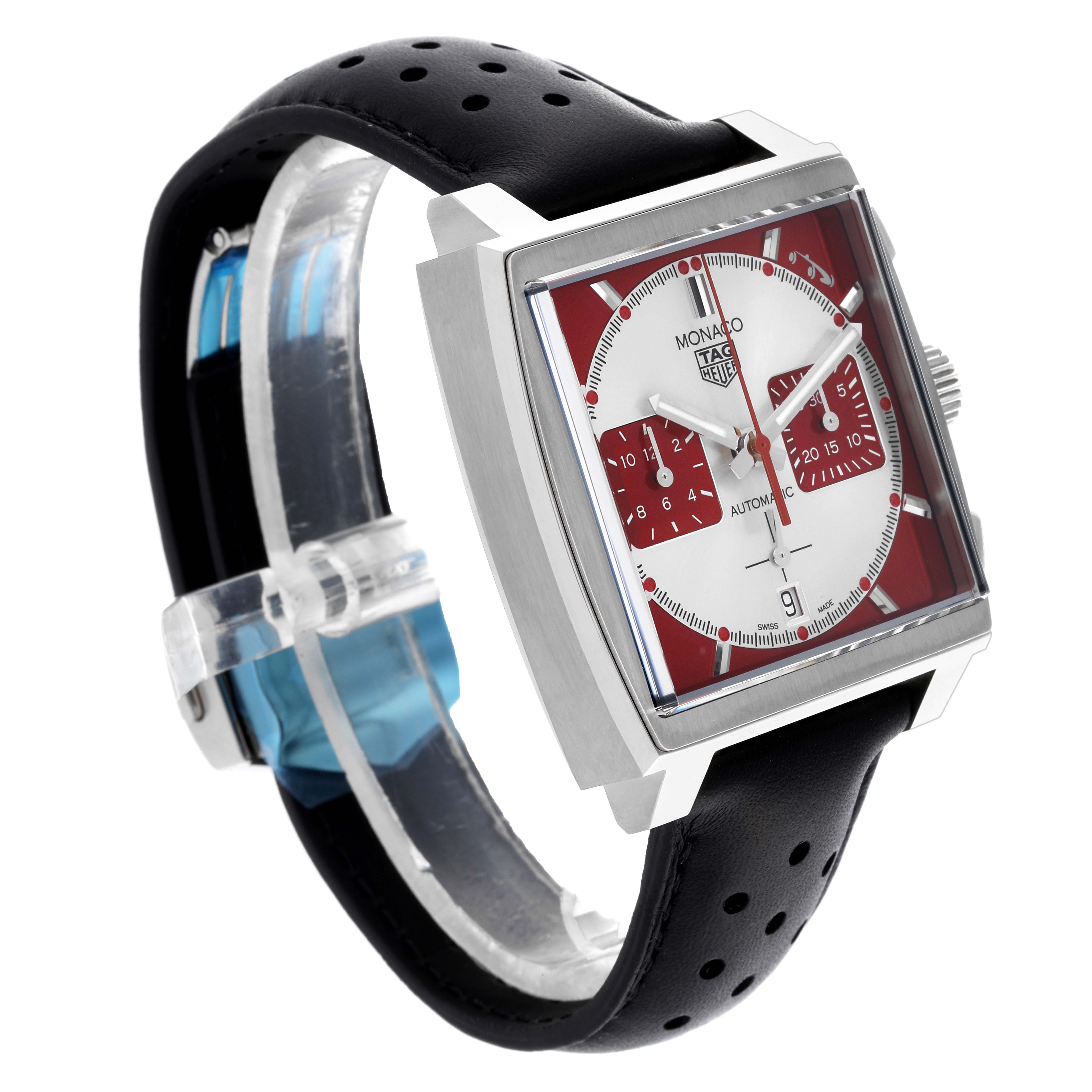 The Tag Heuer Monaco CBL2114.FC6486 Men's Stainless Steel Red Dial CBL2114.FC6486 Men's Stainless Steel Red Dial watch is shown at a front angle, highlighting the face, crown, and perforated black strap.