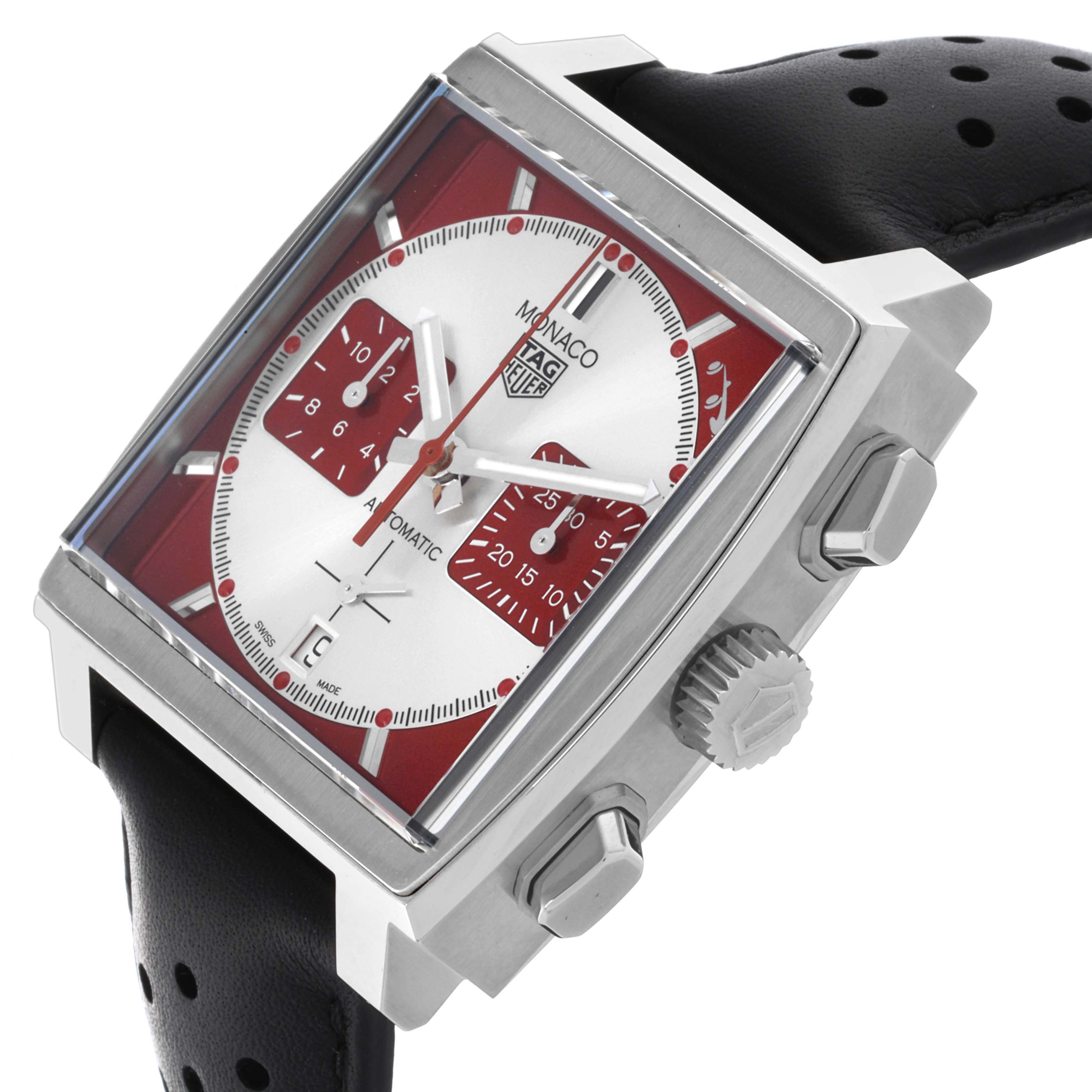 The image shows a side angle of the Tag Heuer Monaco CBL2114.FC6486 Men's Stainless Steel Red Dial CBL2114.FC6486 Men's Stainless Steel Red Dial watch, highlighting the case, dial, crown, and pushers.