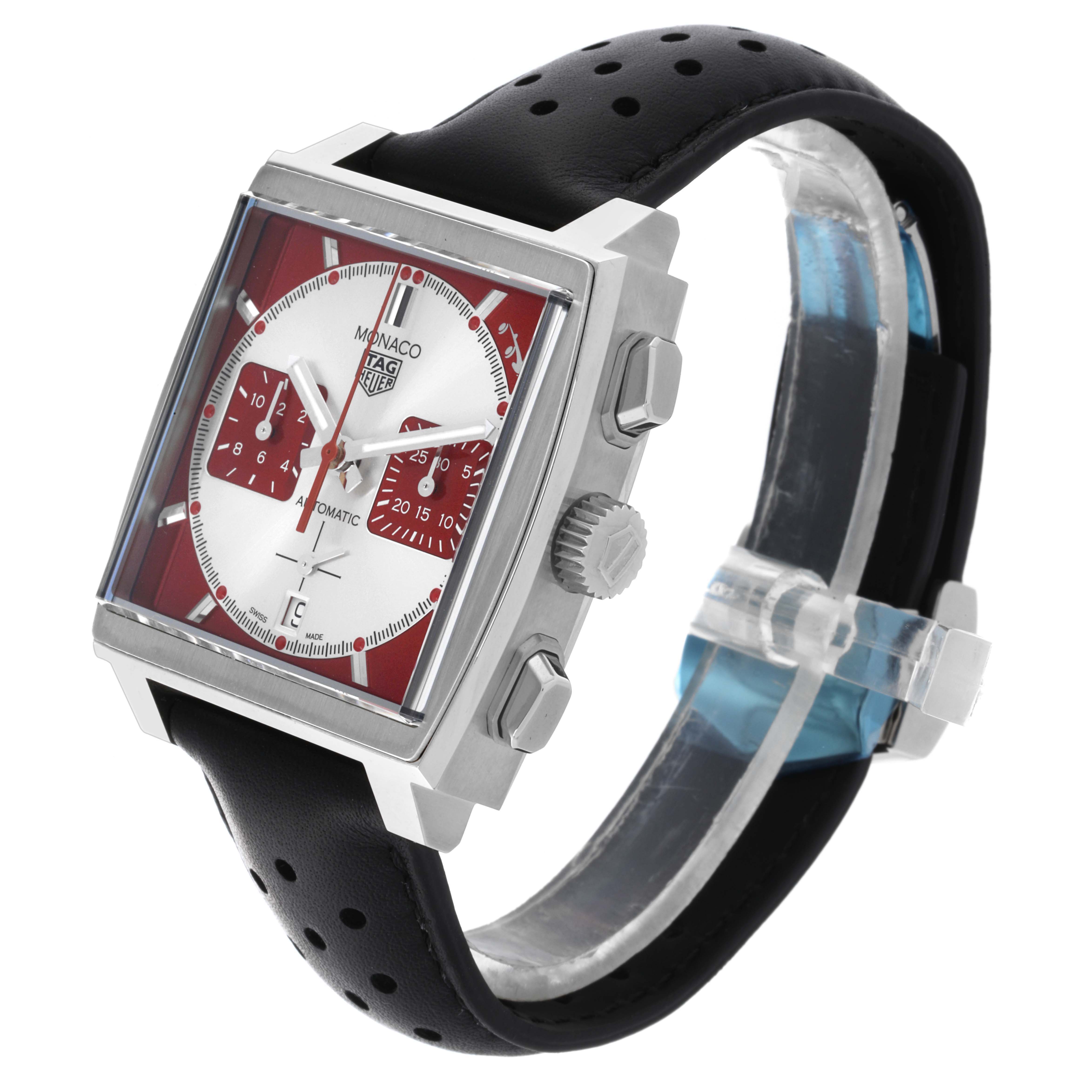 The Tag Heuer Monaco CBL2114.FC6486 Men's Stainless Steel Red Dial CBL2114.FC6486 Men's Stainless Steel Red Dial watch is shown at an angled side view, displaying the face, crown, pushers, and black leather strap.
