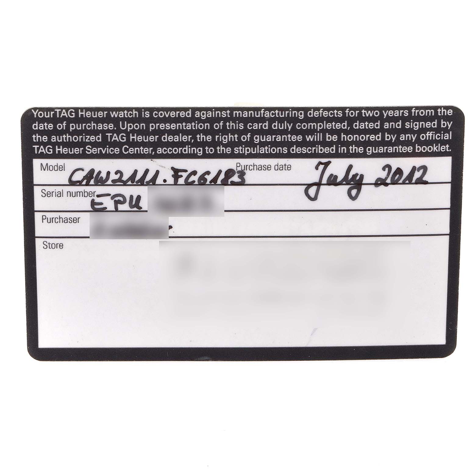 This image shows the warranty card for a Tag Heuer Monaco CAW2111 Men's Stainless Steel Blue Dial CAW2111 Men's Stainless Steel Blue Dial model watch, including the model number and purchase date.