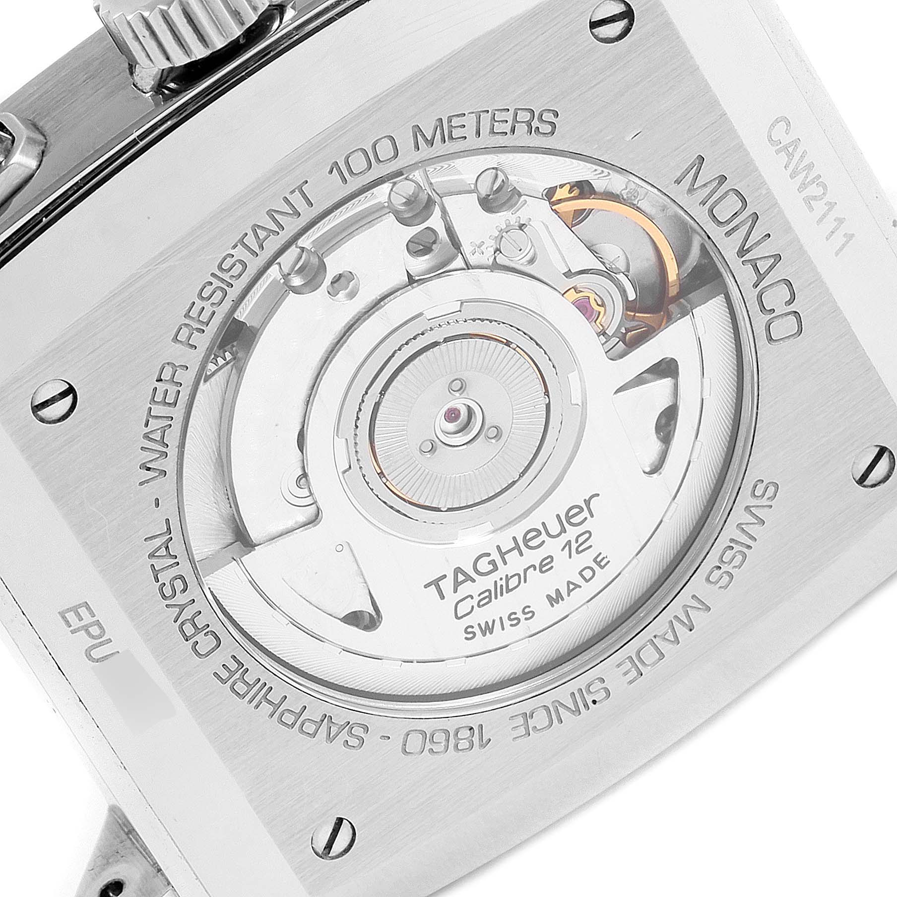 This image shows the case back of the Tag Heuer Monaco CAW2111 Men's Stainless Steel Blue Dial CAW2111 Men's Stainless Steel Blue Dial watch, displaying its movement and engraving details.