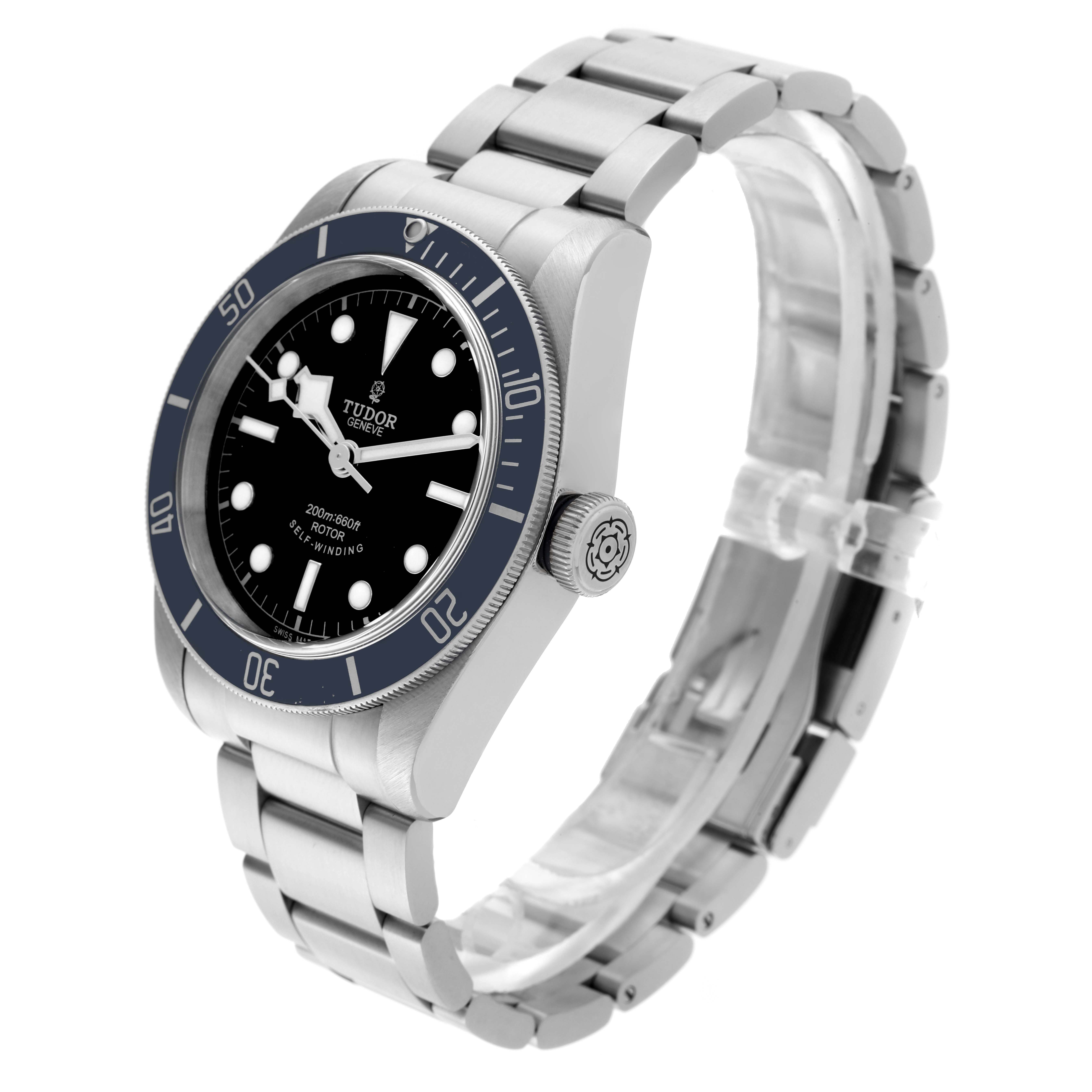 The Tudor Heritage Black Bay 79220B Men
s Stainless Steel Black Dial 79220B Men
s Stainless Steel Black Dial watch is shown at an angled side view displaying its bracelet, dial, bezel, and crown.