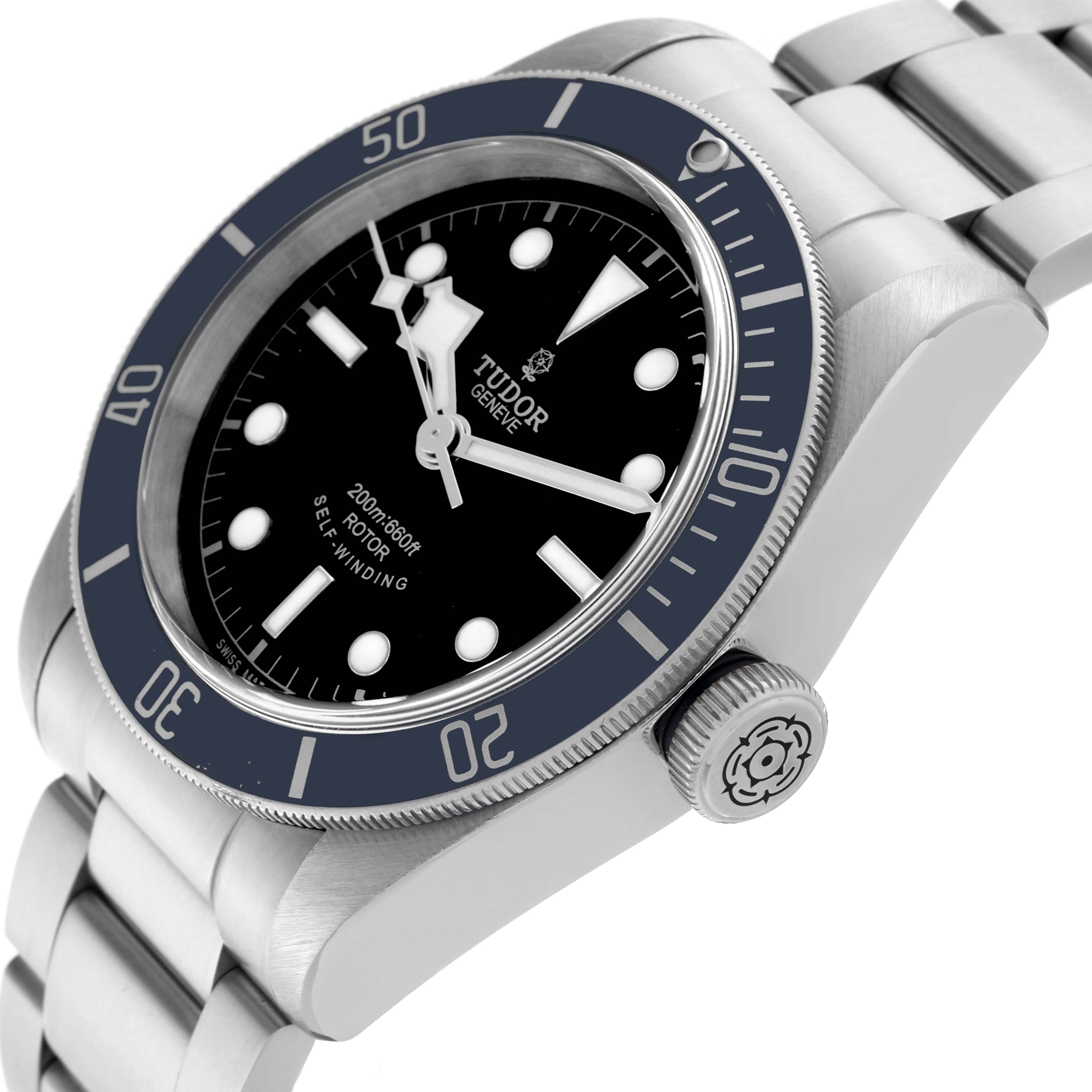 The Tudor Heritage Black Bay 79220B Men
s Stainless Steel Black Dial 79220B Men
s Stainless Steel Black Dial watch is shown at an angle displaying the face, bezel, crown, and part of the bracelet.