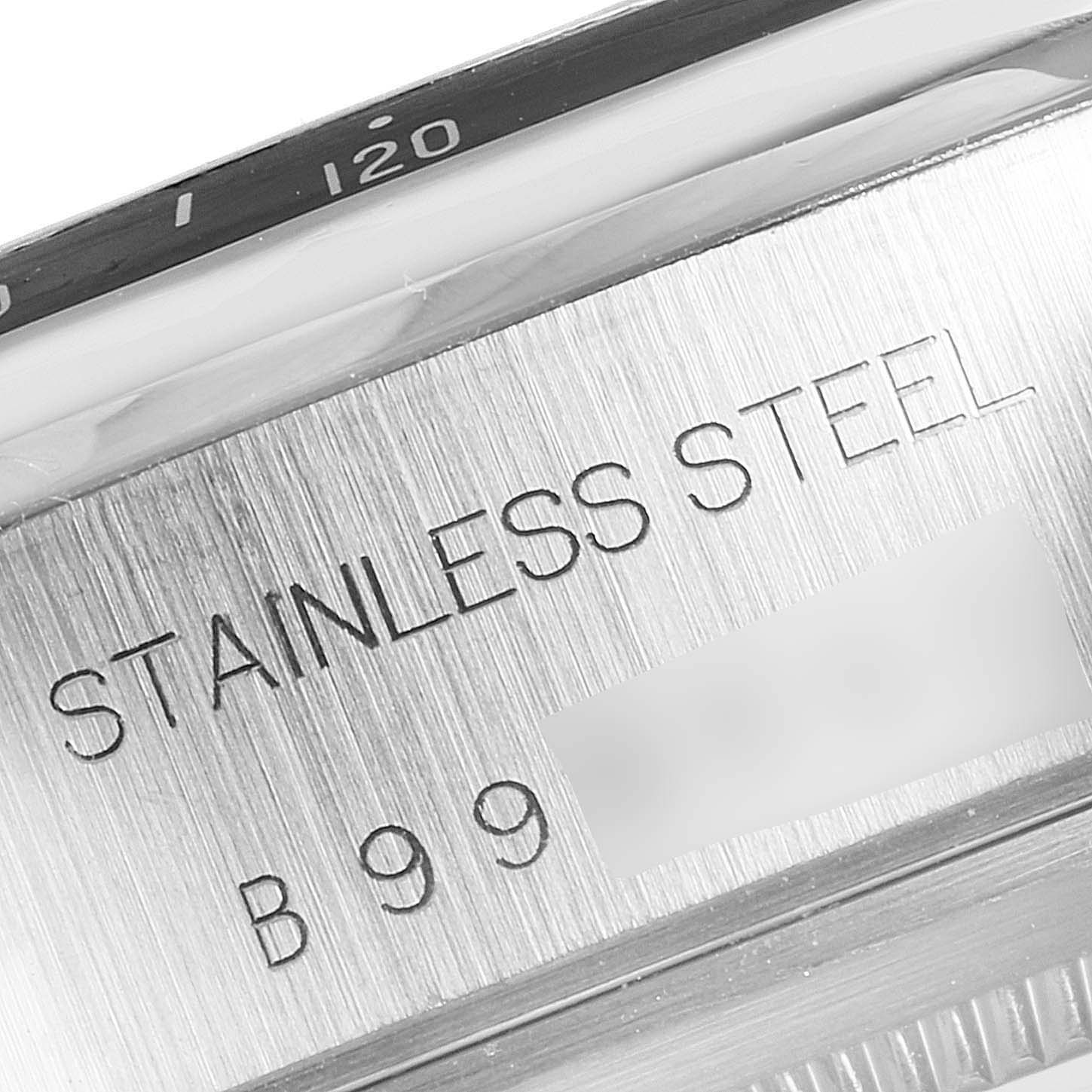 The image shows a close-up of the case side of the Tudor Tiger 79260 Men's Stainless Steel Yellow Dial 79260 Men's Stainless Steel Yellow Dial model watch, highlighting the "STAINLESS STEEL" text and part of the bezel.