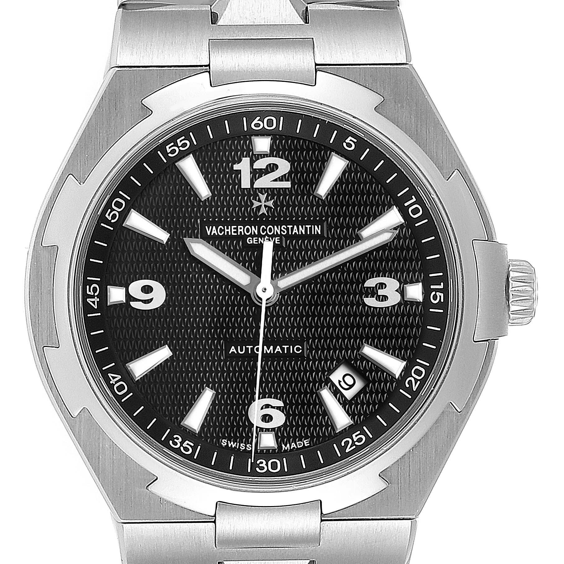 The image shows a close-up, front view of the Vacheron Constantin Overseas 47040/B01A-9094 Men's Stainless Steel Black Dial 47040/B01A-9094 Men's Stainless Steel Black Dial watch, highlighting the dial, hands, and crown.