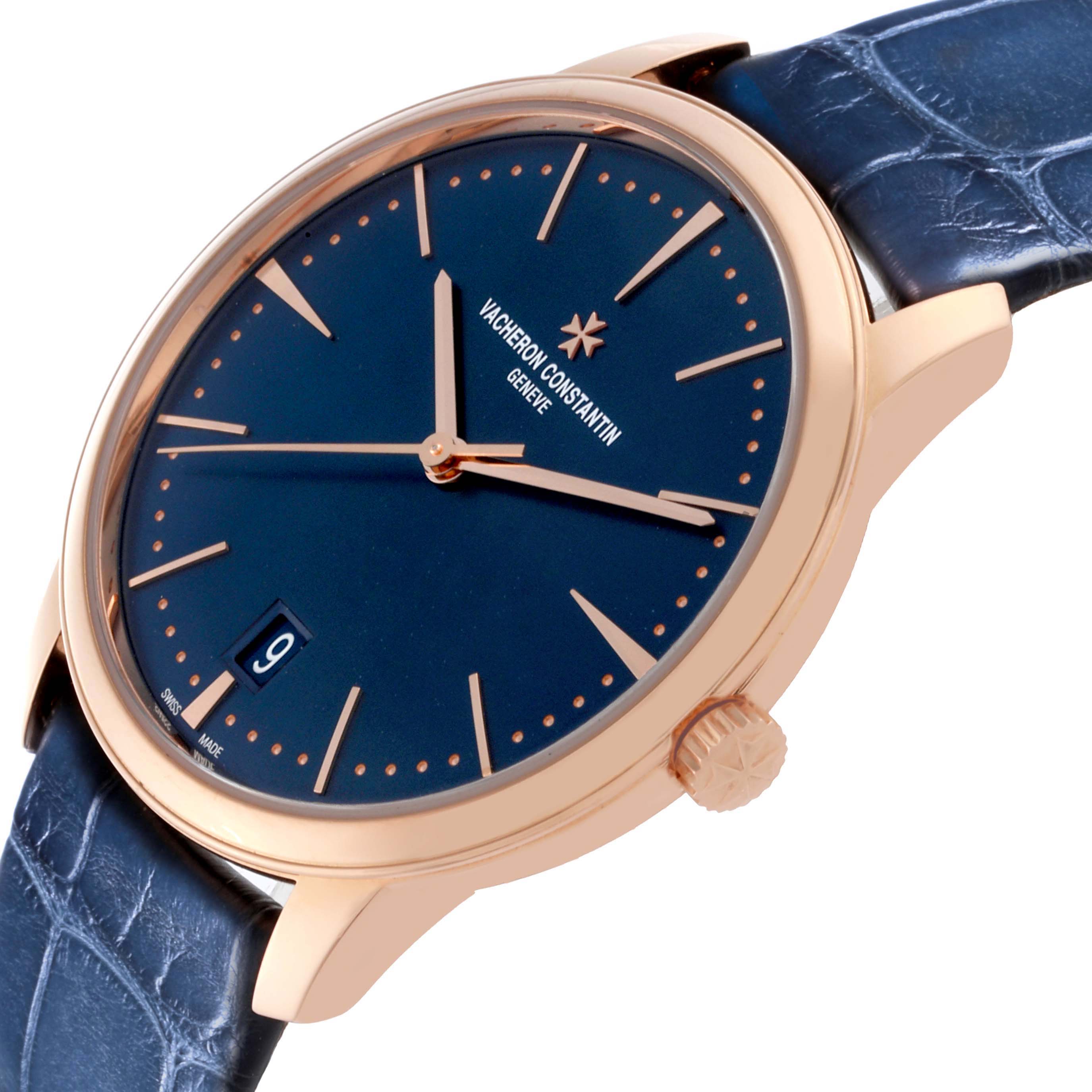 The Vacheron Constantin Patrimony 4100U/000R-B643 Men's Rose Gold Blue Dial 4100U/000R-B643 Men's Rose Gold Blue Dial watch is shown in a side angle, highlighting the dial, crown, and strap.