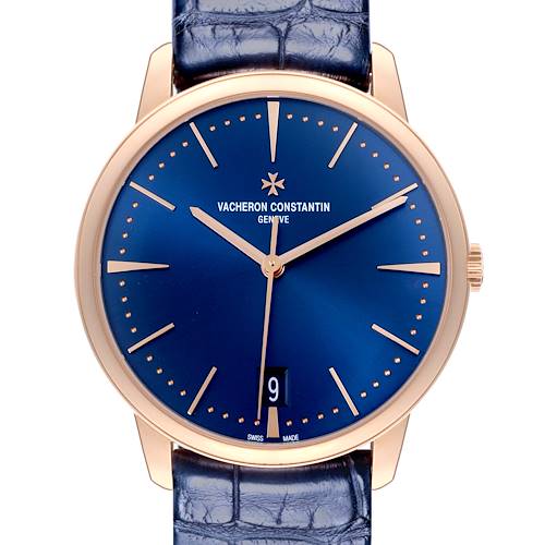 The image shows a front view of the Vacheron Constantin Patrimony watch, displaying its blue dial, gold case, and date window.