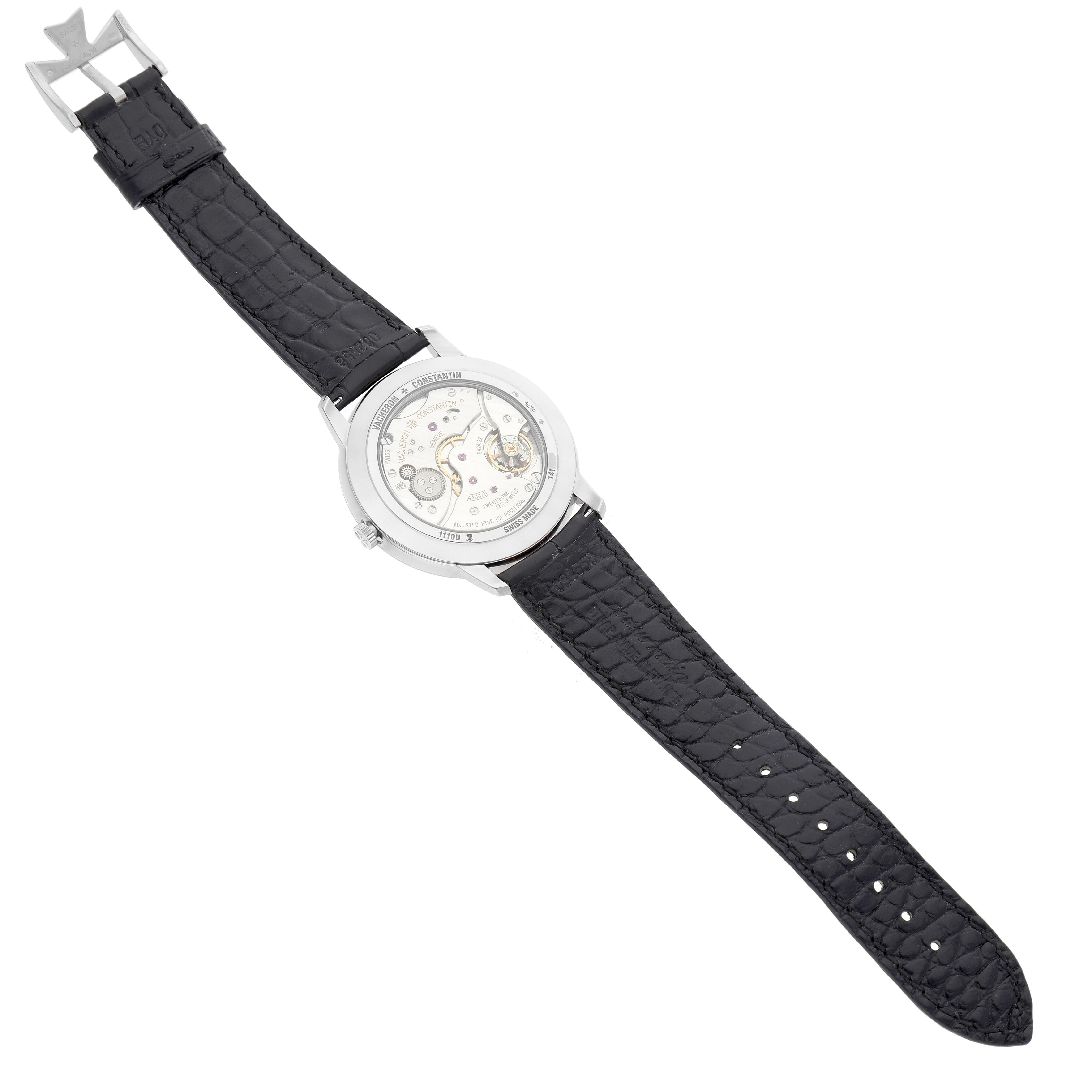 The Vacheron Constantin Patrimony 1110U/000G-B086 Men's White Gold Silver Dial watch is shown from the back, displaying its movement and black leather strap.