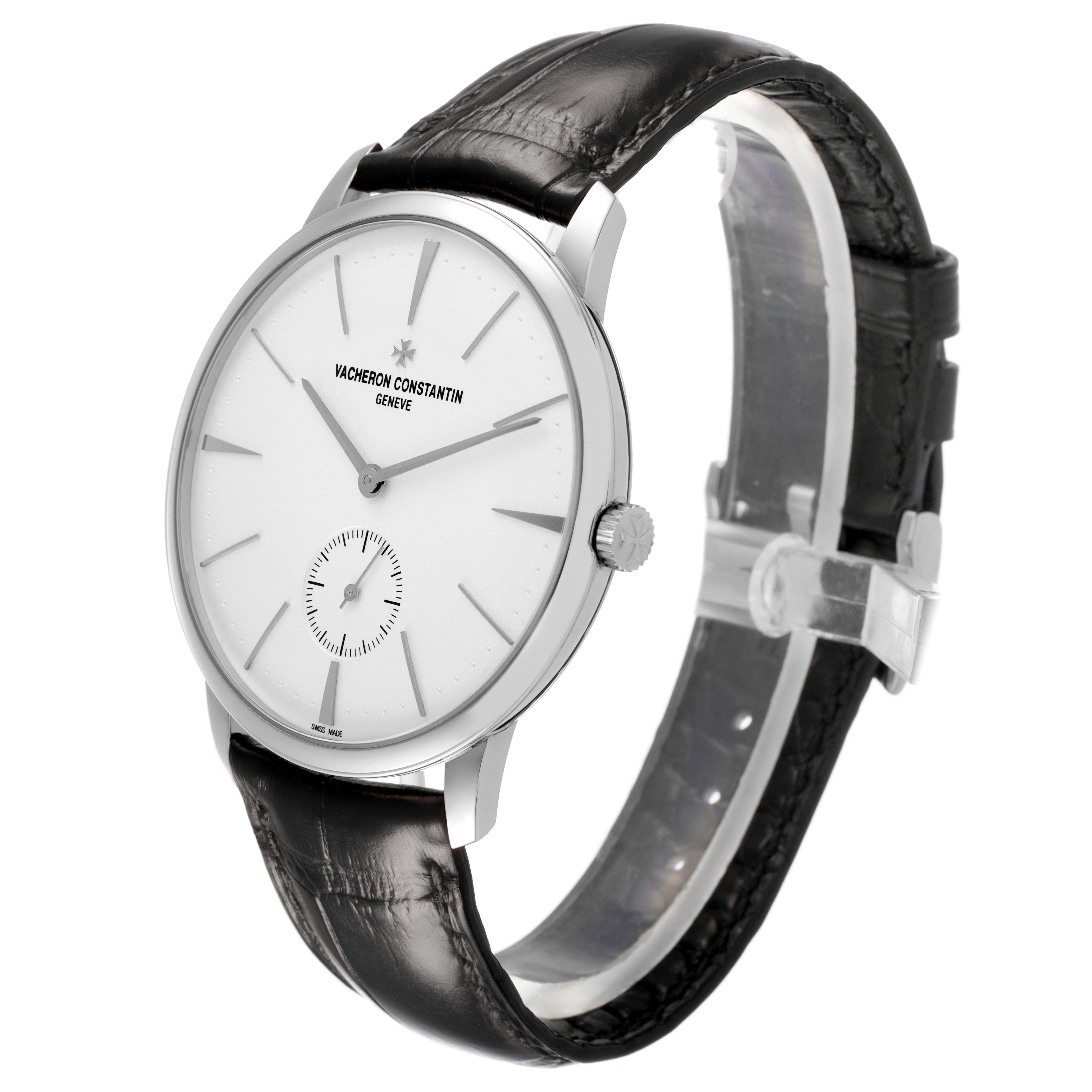 The Vacheron Constantin Patrimony 1110U/000G-B086 Men's White Gold Silver Dial watch is shown at a three-quarter angle, displaying the dial, crown, and leather strap.