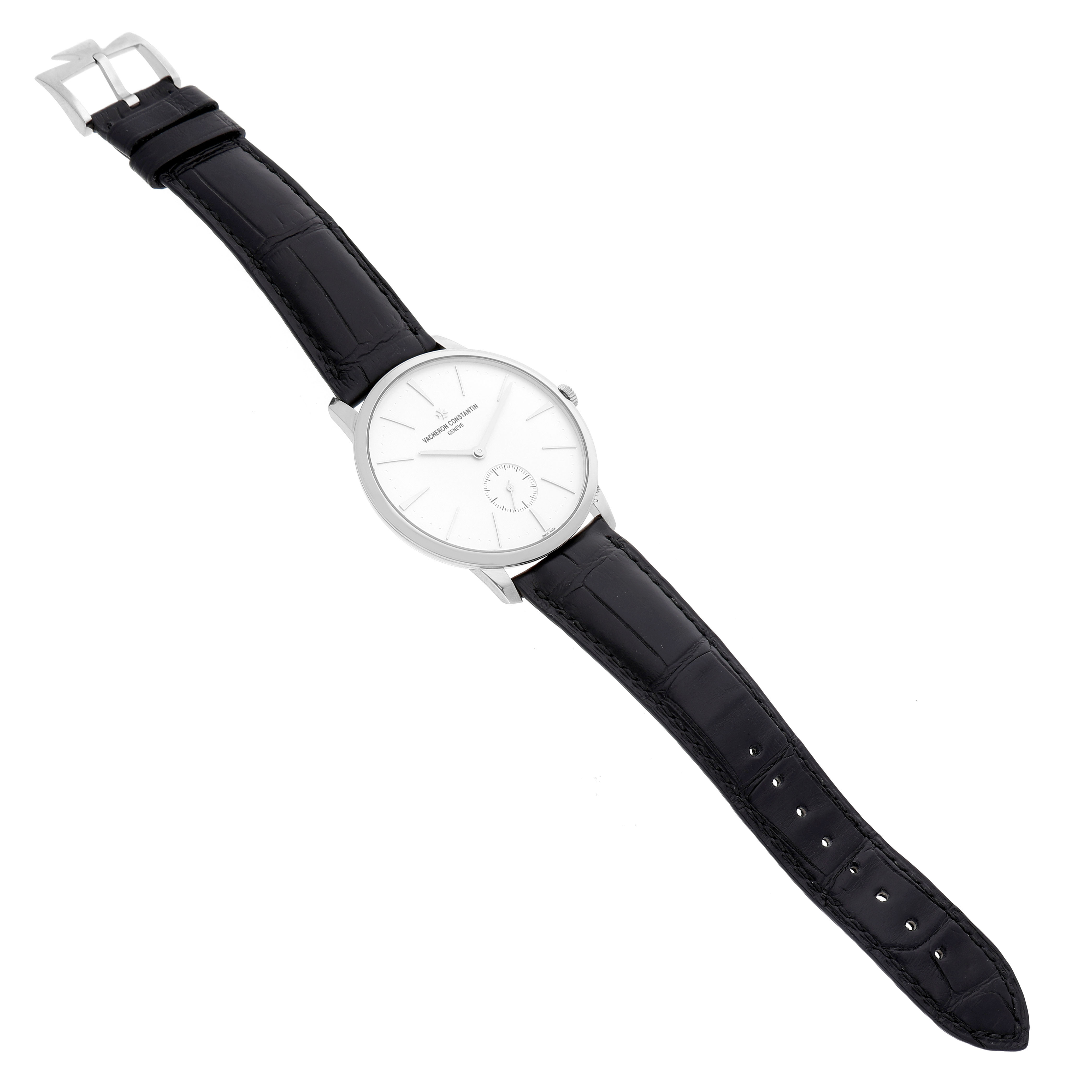 The Vacheron Constantin Patrimony 1110U/000G-B086 Men's White Gold Silver Dial watch is shown from a top-down angle, displaying the full watch face and black leather strap.