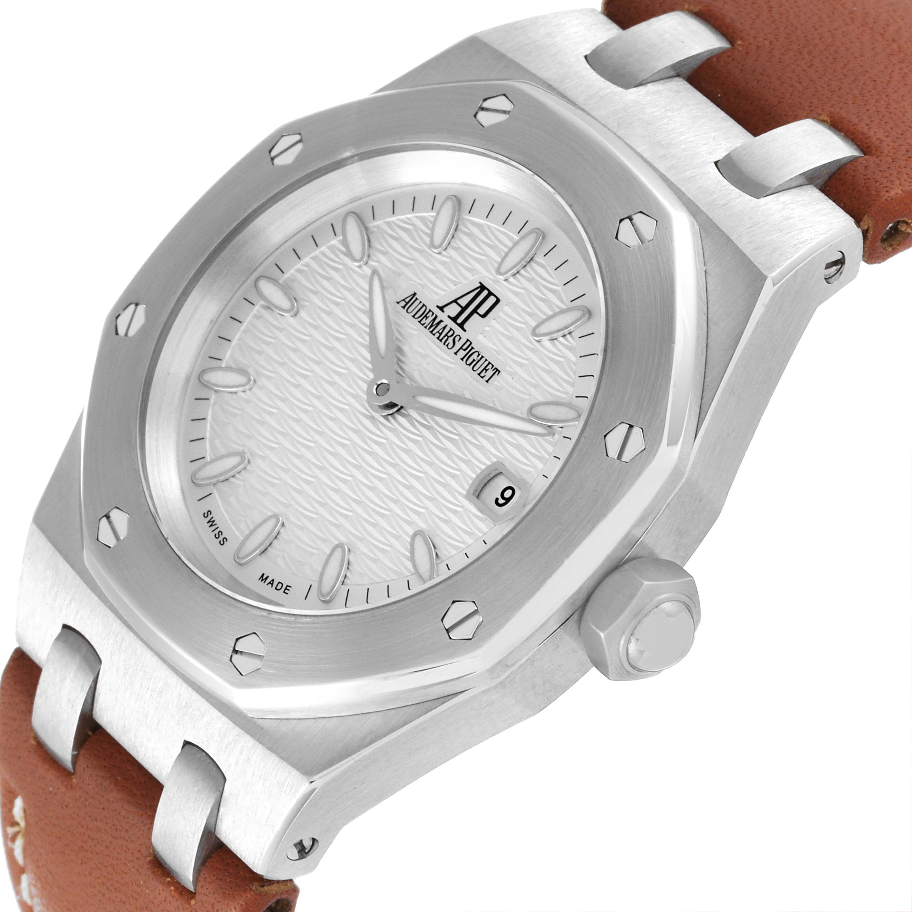 The image shows an angled view of the Audemars Piguet Royal Oak 67600ST.OO.D080VS.01 Women's Stainless Steel Silver Dial 67600ST.OO.D080VS.01 Women's Stainless Steel Silver Dial watch face, bezel, crown, and part of the leather strap.