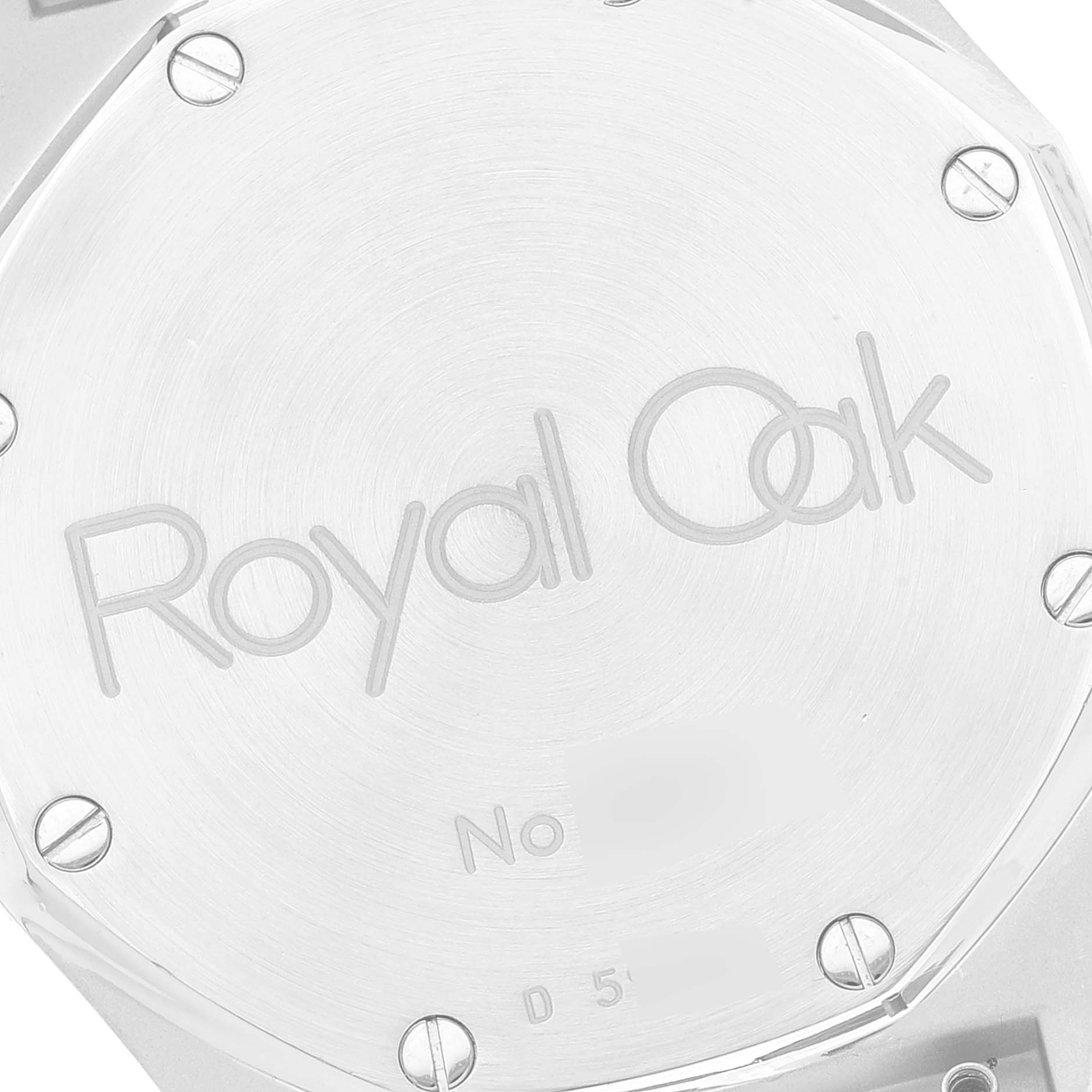 The image shows the back case of the Audemars Piguet Royal Oak Men
s Steel and Gold (two tone) Grey Dial Men
s Steel and Gold (two tone) Grey Dial watch, showcasing the engraved model name and screws.