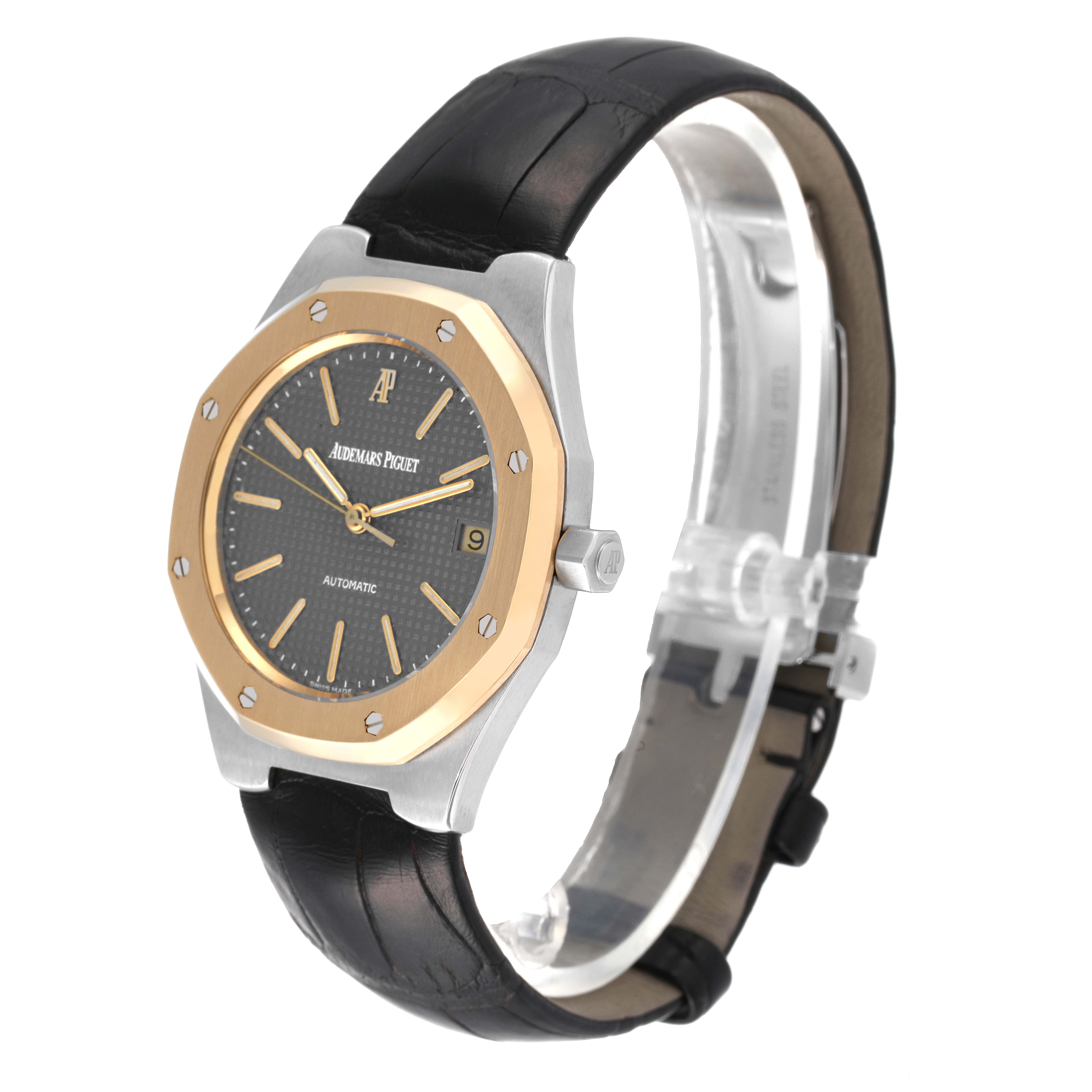 The image shows a Royal Oak model by Audemars Piguet, viewed from an angle that highlights the watch face and leather strap.