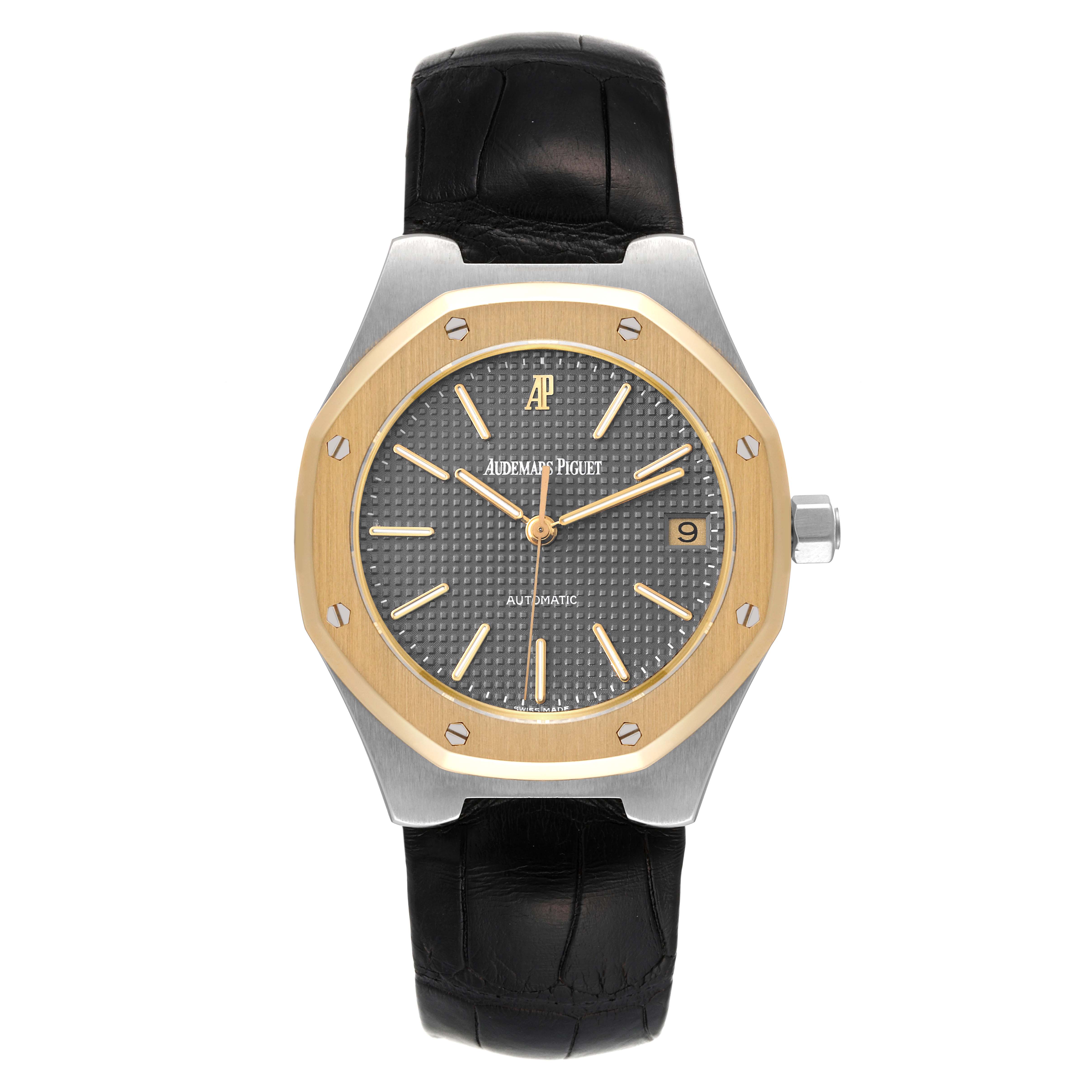 This image displays the front view of an Audemars Piguet Royal Oak Men
s Steel and Gold (two tone) Grey Dial Men
s Steel and Gold (two tone) Grey Dial watch, featuring its dial, bezel, case, and strap.