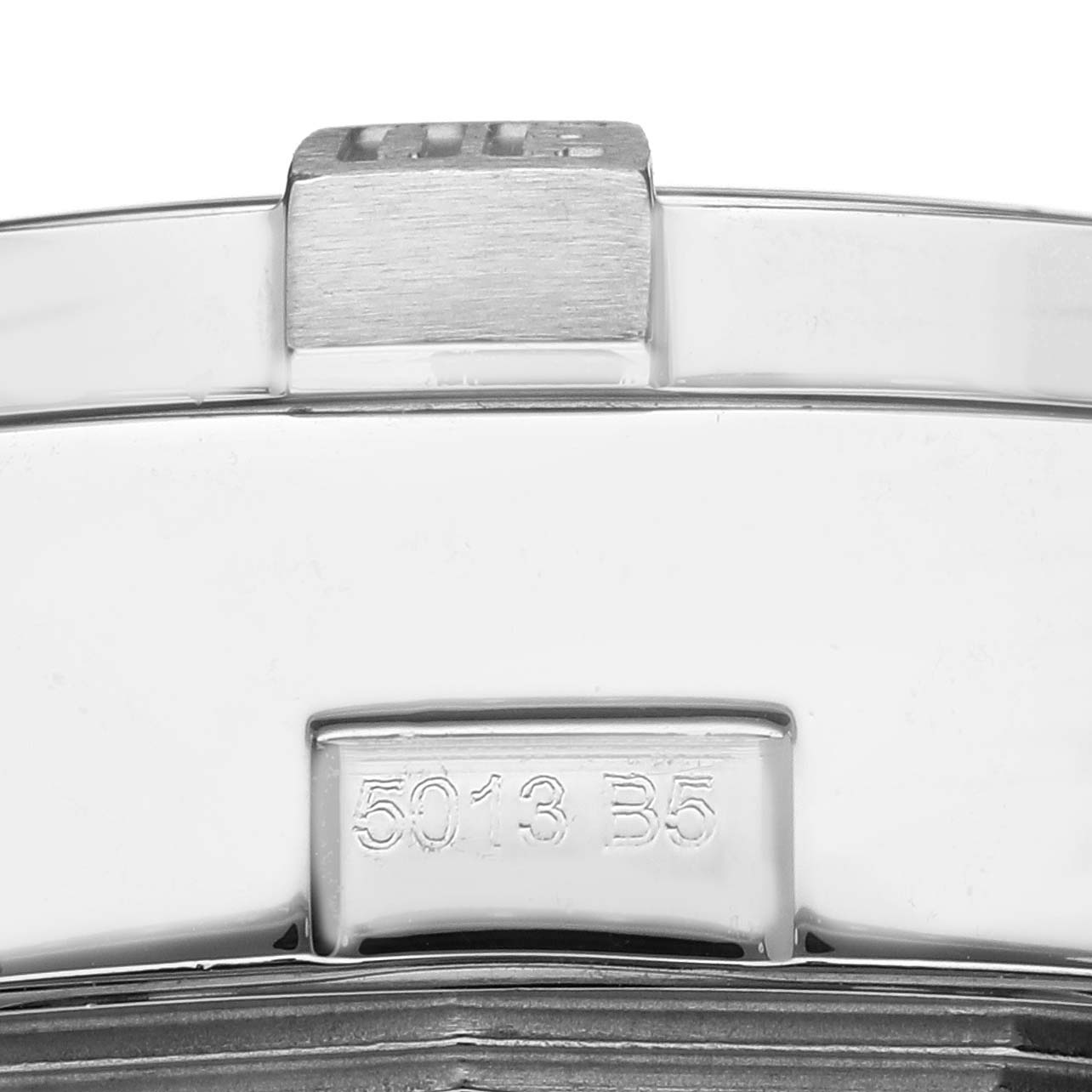 This image shows a close-up of the clasp on a Breitling Avenger A13381 Men's Stainless Steel Blue Dial A13381 Men's Stainless Steel Blue Dial watch bracelet, featuring engraved details.