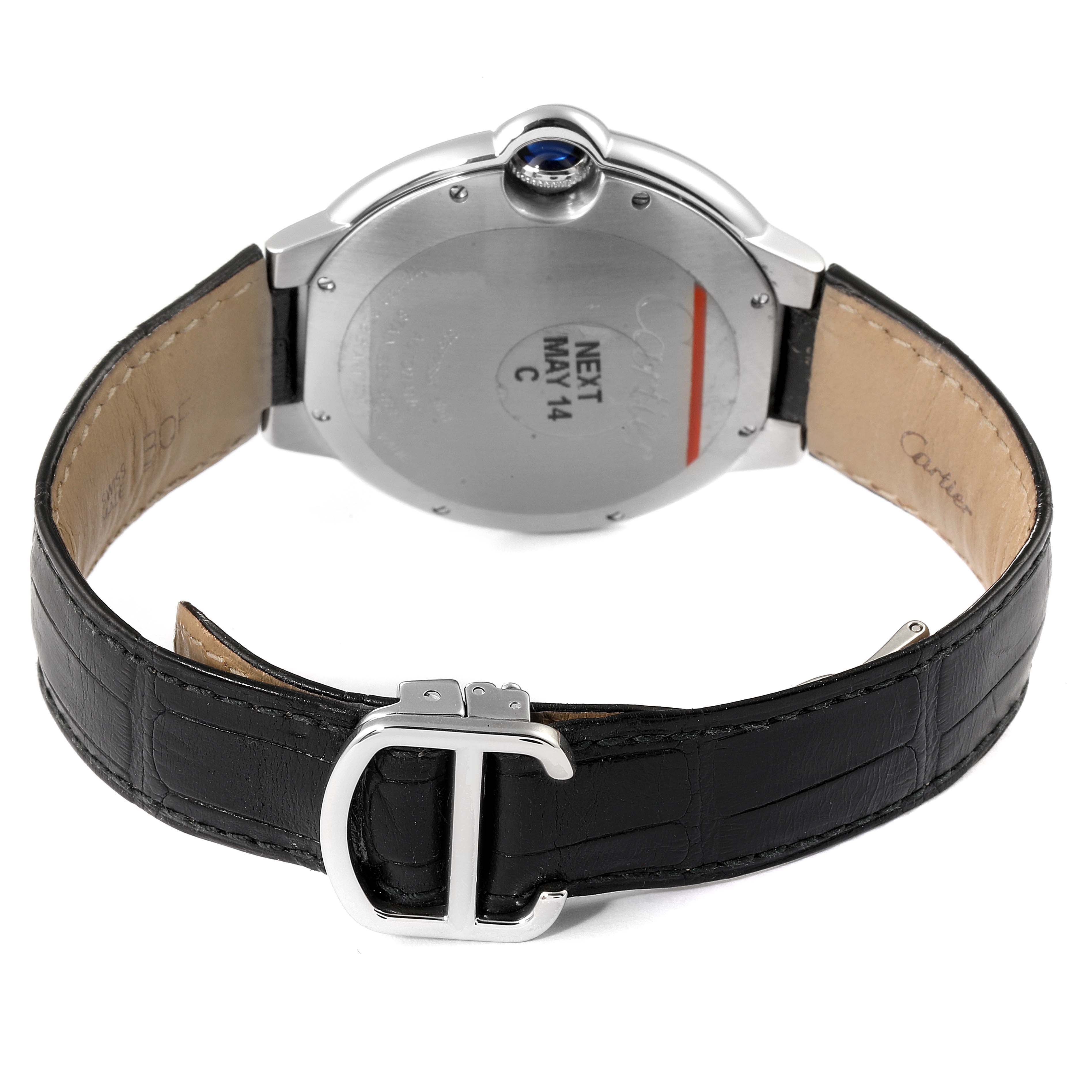 The image shows the back view of a Cartier Ballon Bleu W69016Z4 Men's Stainless Steel Silver Dial W69016Z4 Men's Stainless Steel Silver Dial watch, featuring its case back, crown, and leather strap with a buckle.