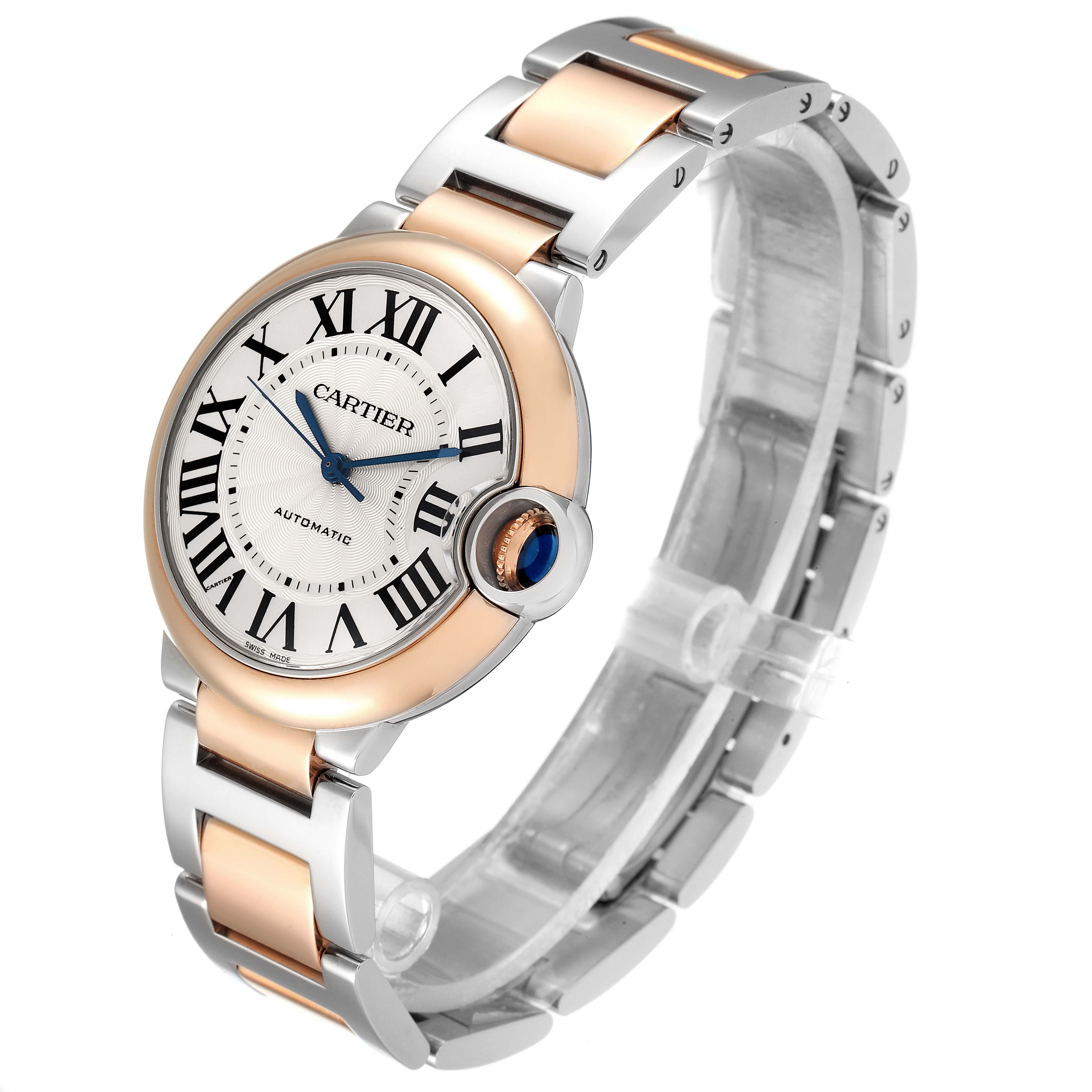The Ballon Bleu de Cartier watch is shown at a 3/4 angle, highlighting its round face, Roman numerals, and two-tone bracelet.