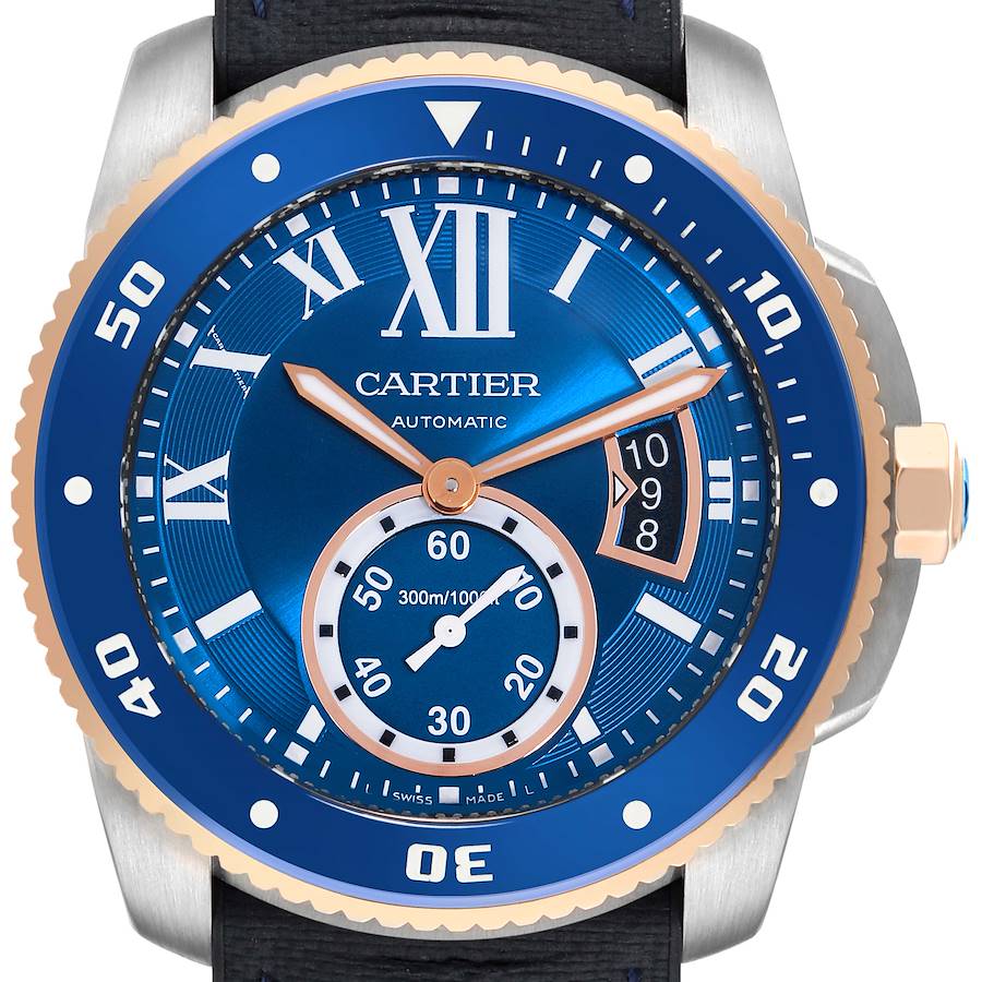 The image shows a frontal view of a Calibre de Cartier watch, highlighting the blue face, hands, and bezel details.