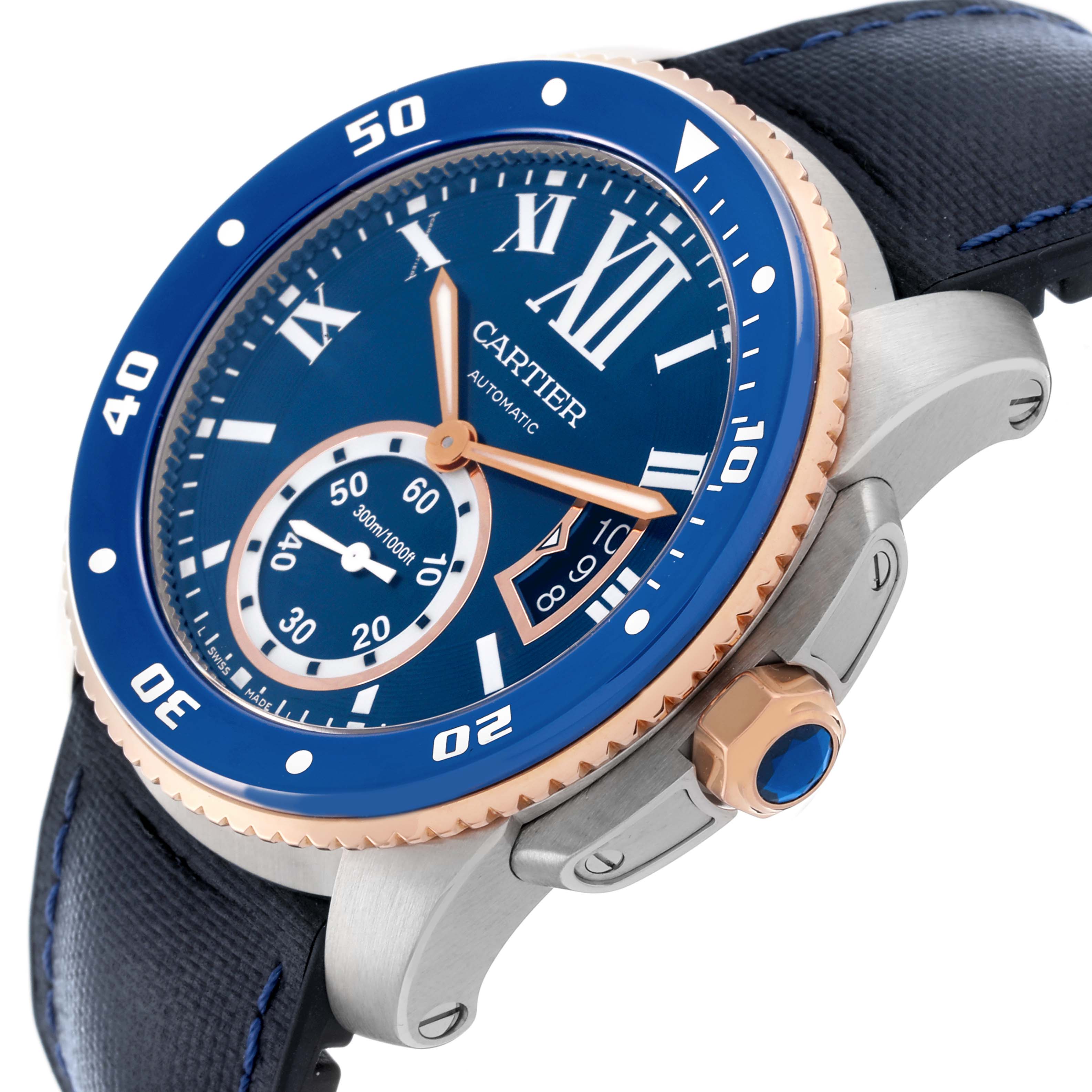 The Calibre de Cartier watch is shown at an angled view, highlighting the bezel, dial, crown, and part of the strap.