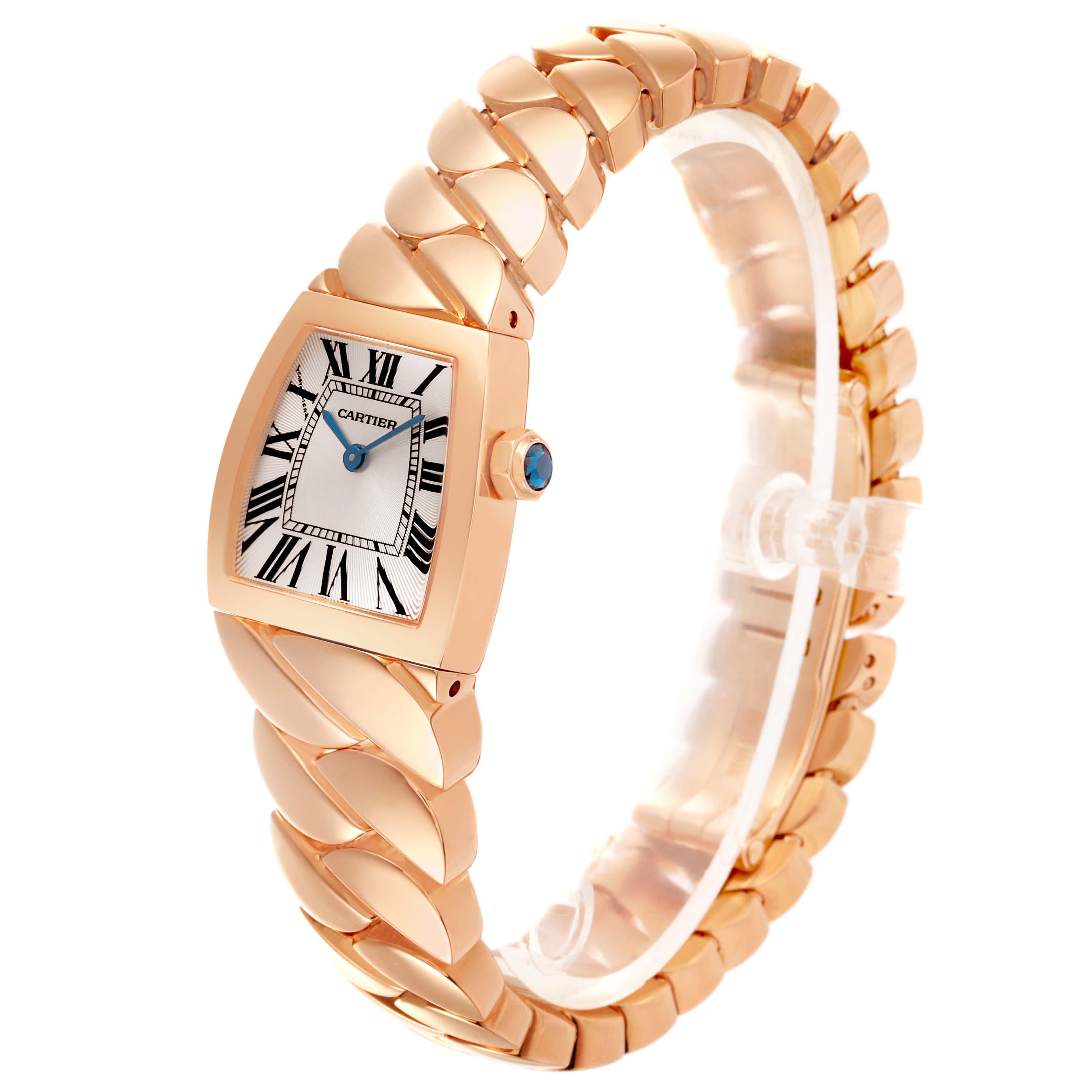 The Cartier La Dona W6400301 Women
s Rose Gold Silver Dial W6400301 Women
s Rose Gold Silver Dial watch is shown at an angled side view displaying the face and unique chain-link bracelet.