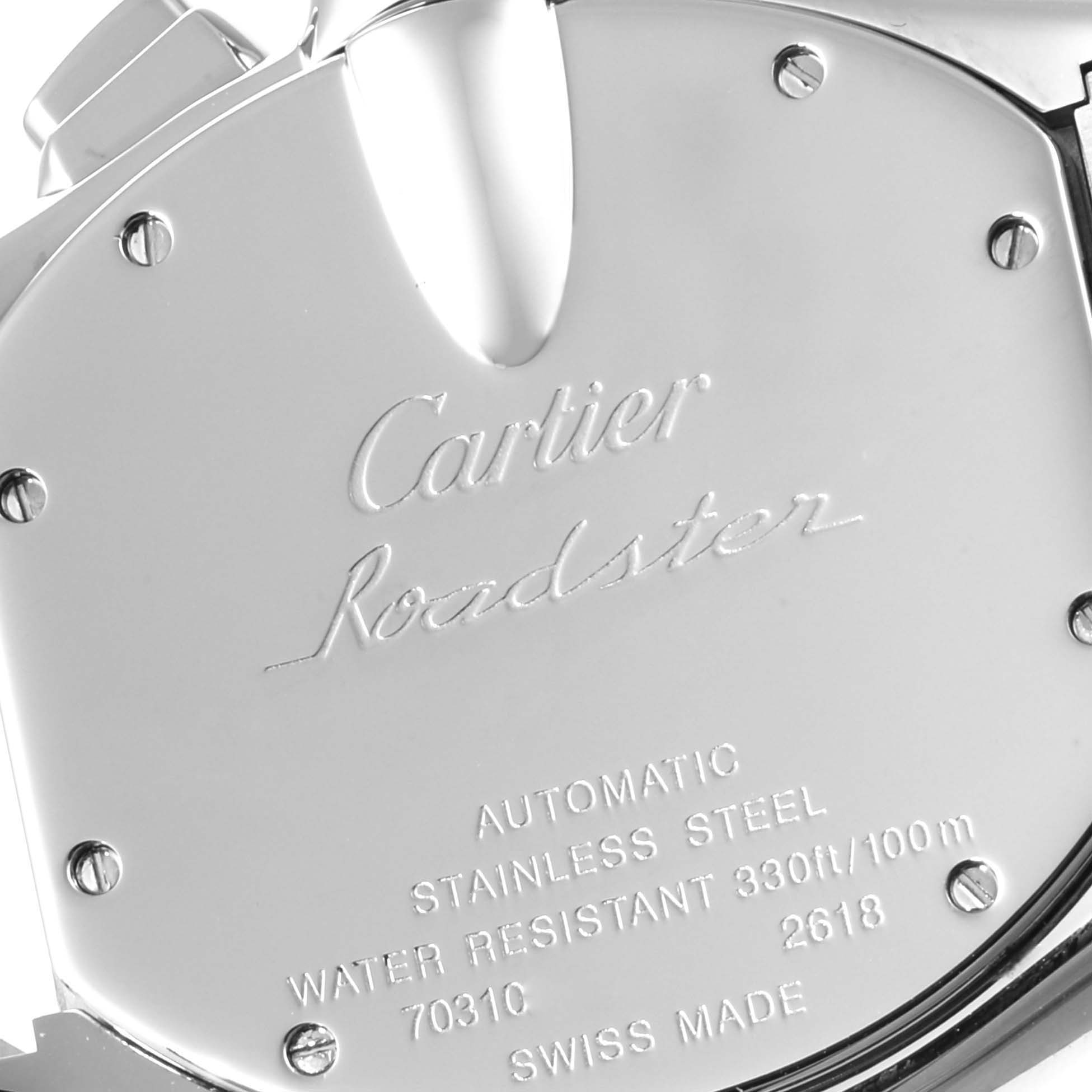 This image shows the back case of a Cartier Roadster W62019X6 Men
s Stainless Steel Silver Dial W62019X6 Men
s Stainless Steel Silver Dial watch, highlighting engravings and screws.