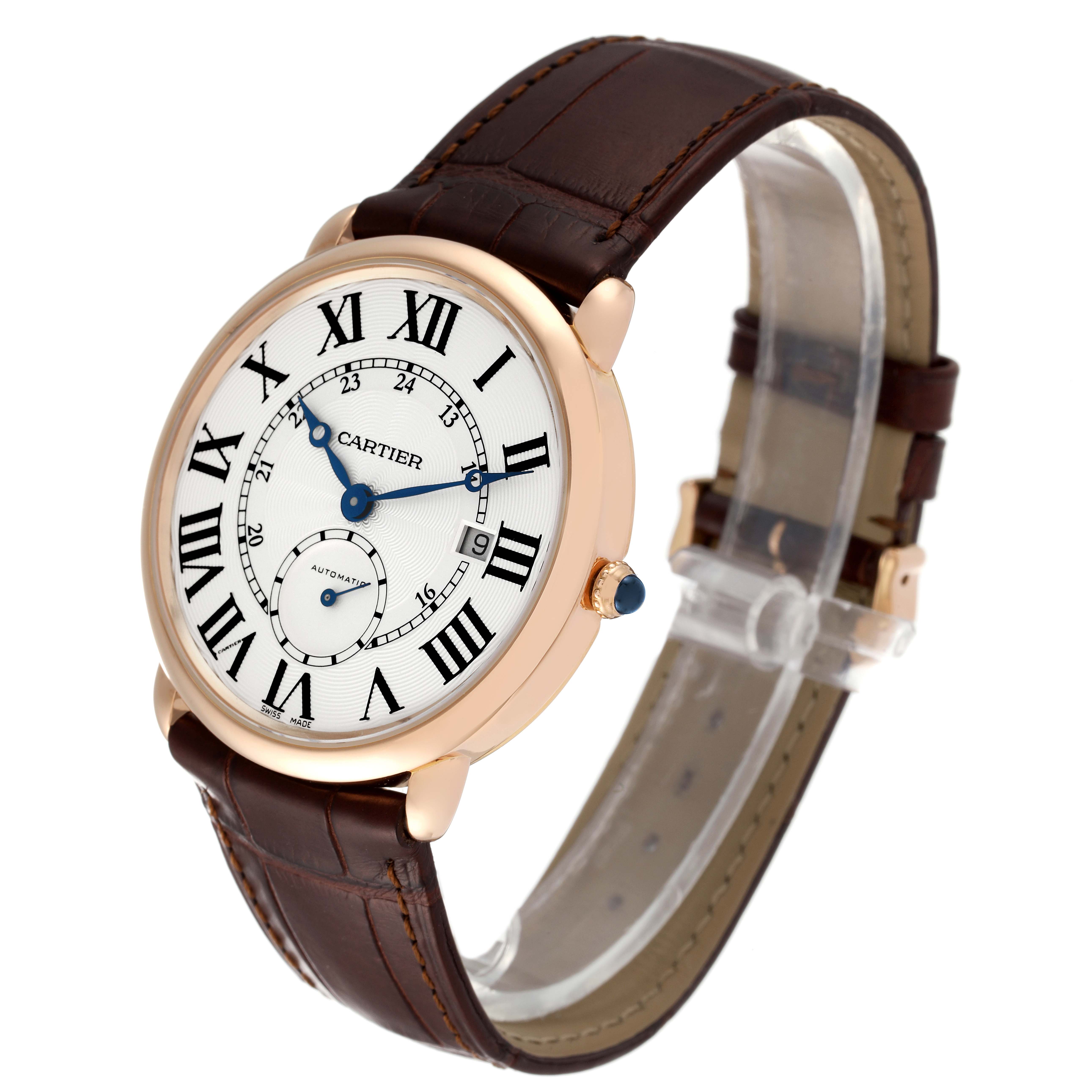 The Cartier Ronde W6801005 Men
s Rose Gold Silver Dial W6801005 Men
s Rose Gold Silver Dial watch is shown at an angled view, displaying the face, crown, and leather strap.