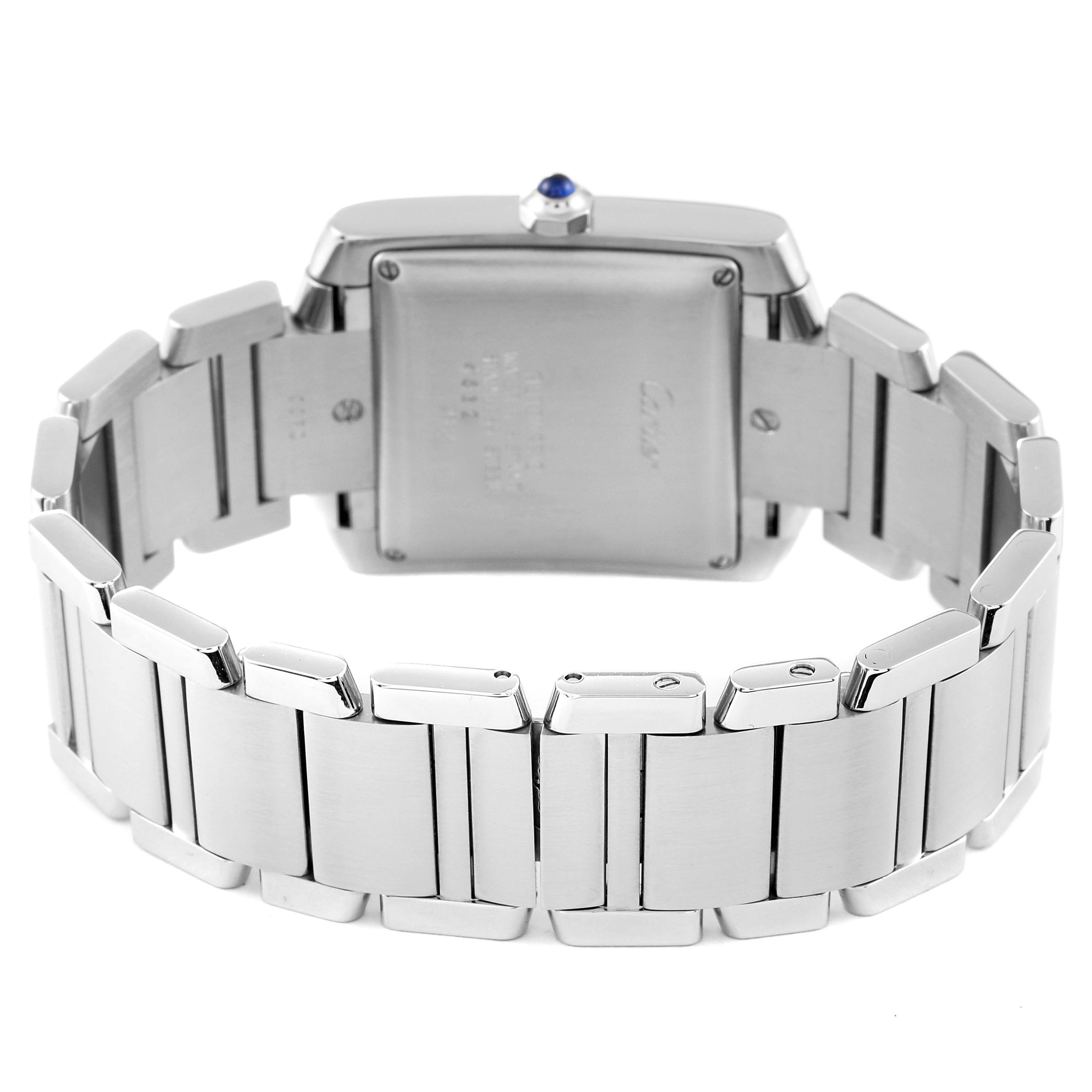 The image shows the back view of a Tank Francaise watch by Cartier, highlighting its metal bracelet and caseback.