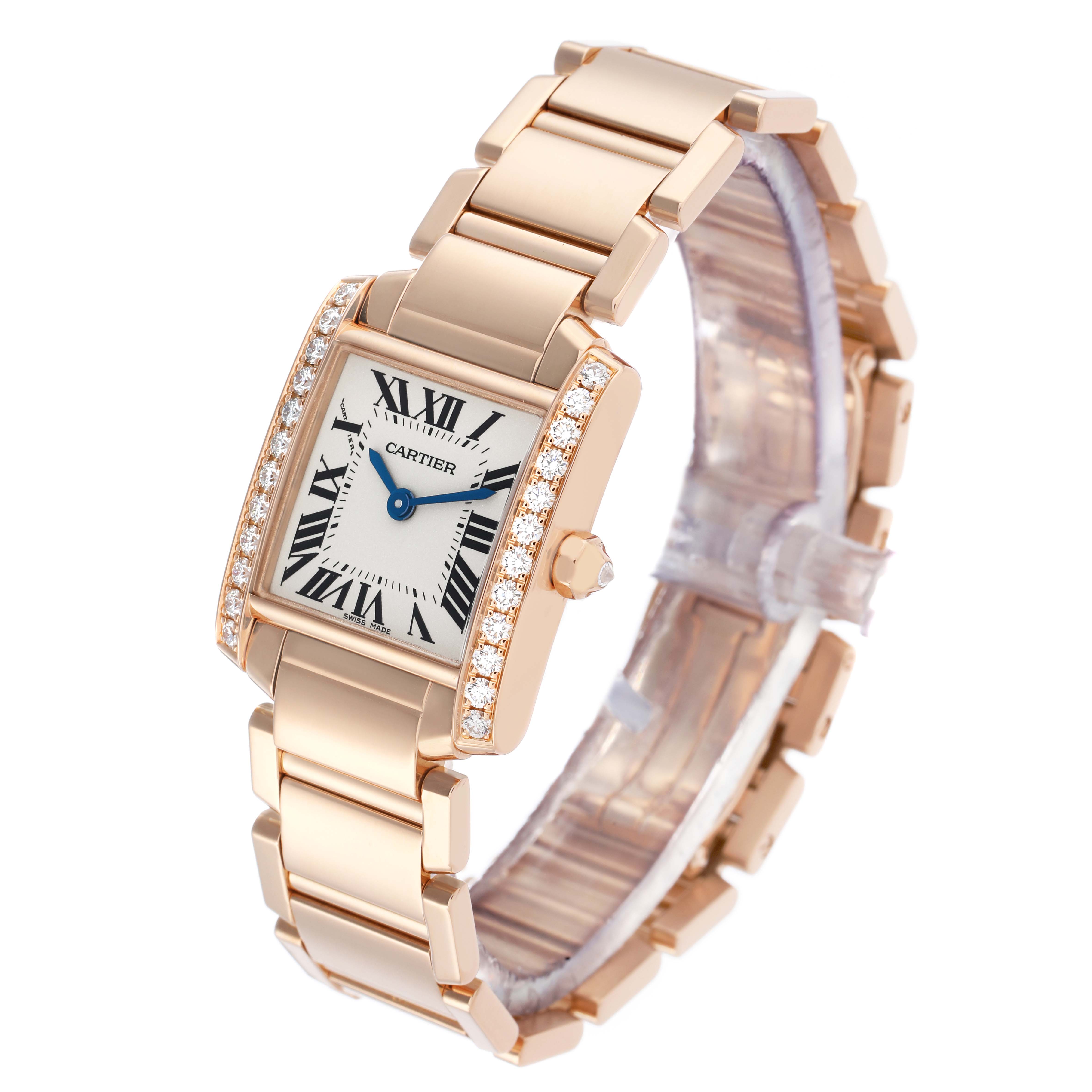 The Cartier Tank Francaise WJTA0022 Women's Rose Gold Silver Dial watch is shown at an angled view, highlighting the face, Roman numerals, bracelet, and diamond accents.