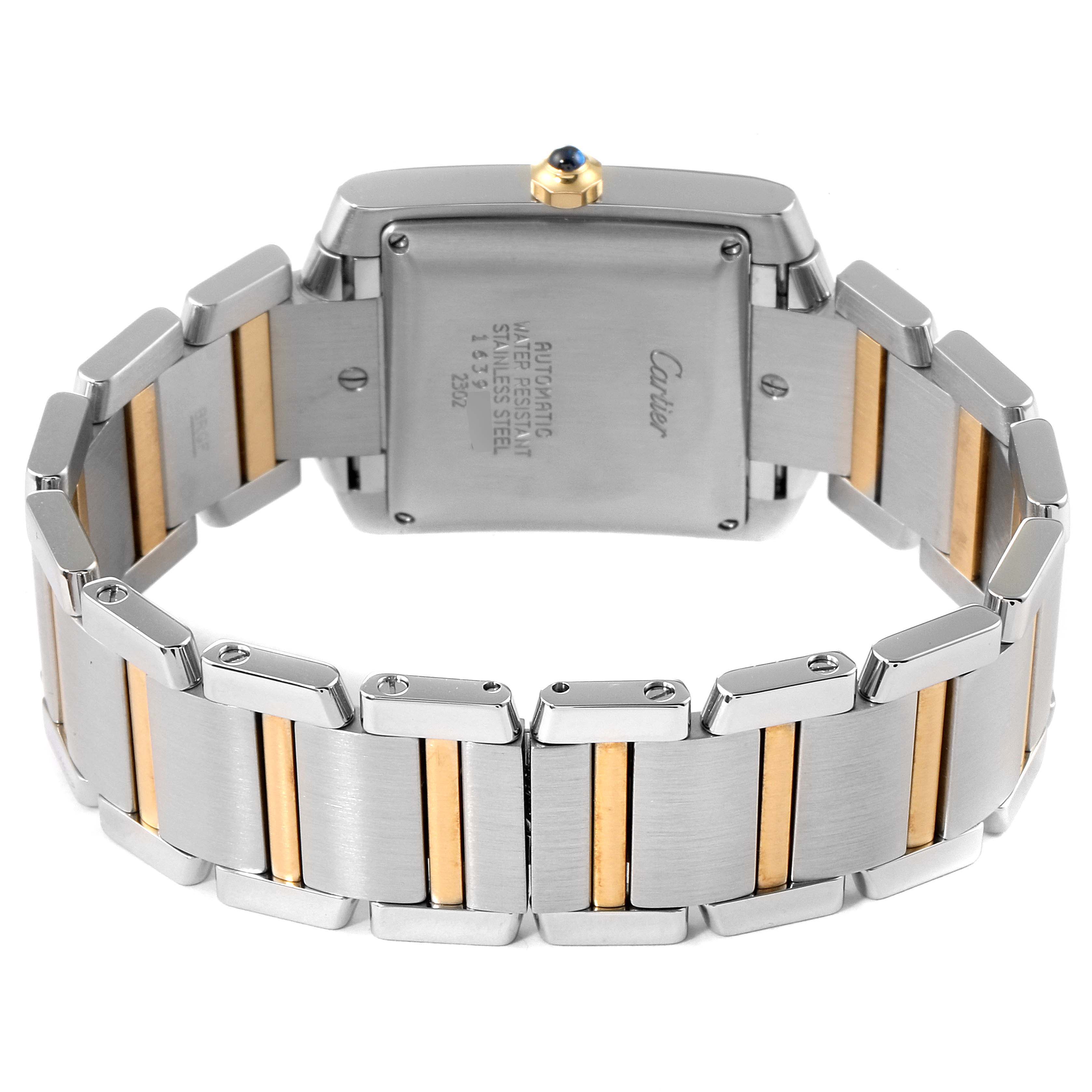 The image shows the back and bracelet of a Cartier Tank Francaise W51005Q4 Men's Steel and Gold (two tone) Silver Dial W51005Q4 Men's Steel and Gold (two tone) Silver Dial watch, highlighting its two-tone design and rear casing.