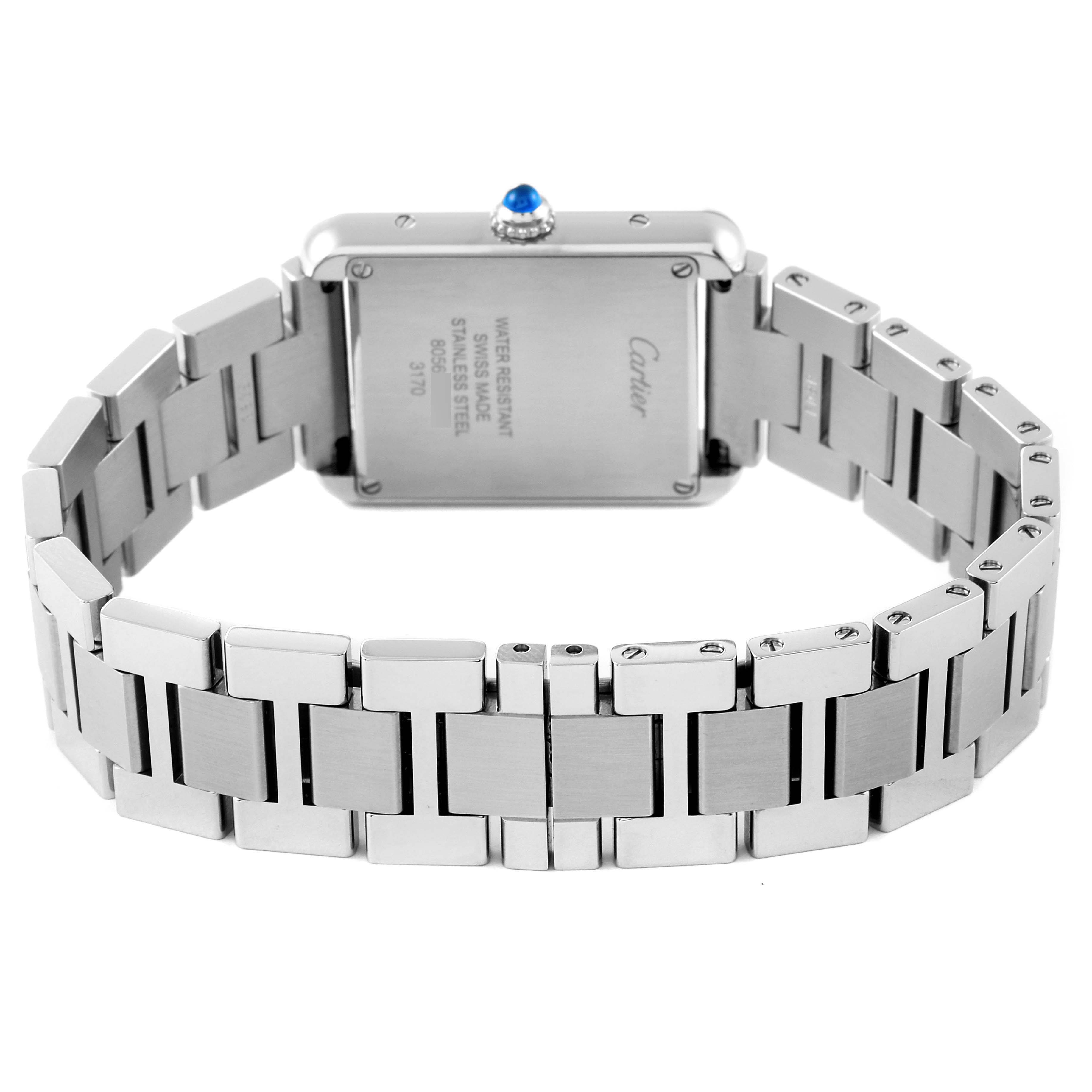 The image shows the rear view of a Cartier Tank Solo W5200013 Women
s Stainless Steel Silver Dial W5200013 Women
s Stainless Steel Silver Dial watch, focusing on the case back and stainless steel bracelet.
