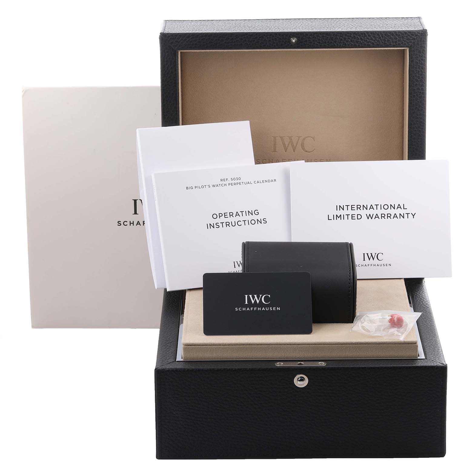 The image shows the packaging and accessories for an IWC Pilot IW503004 Men's Ceramic Grey Dial IW503004 Men's Ceramic Grey Dial watch, including manuals, a warranty card, and a storage box.