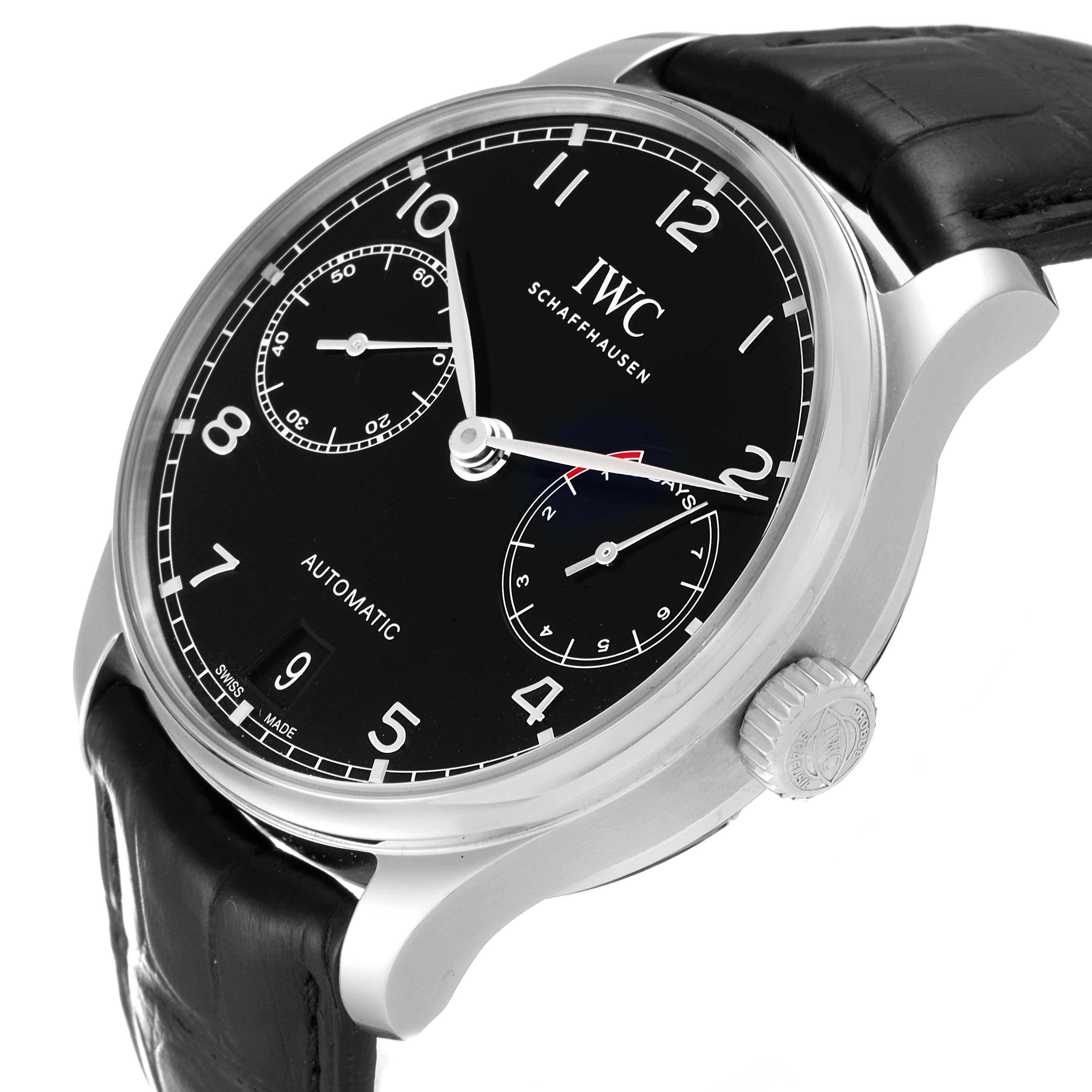 The image shows an angled view of the IWC Portuguese IW500703 Men's Stainless Steel Black Dial IW500703 Men's Stainless Steel Black Dial watch's face, crown, and black leather strap.