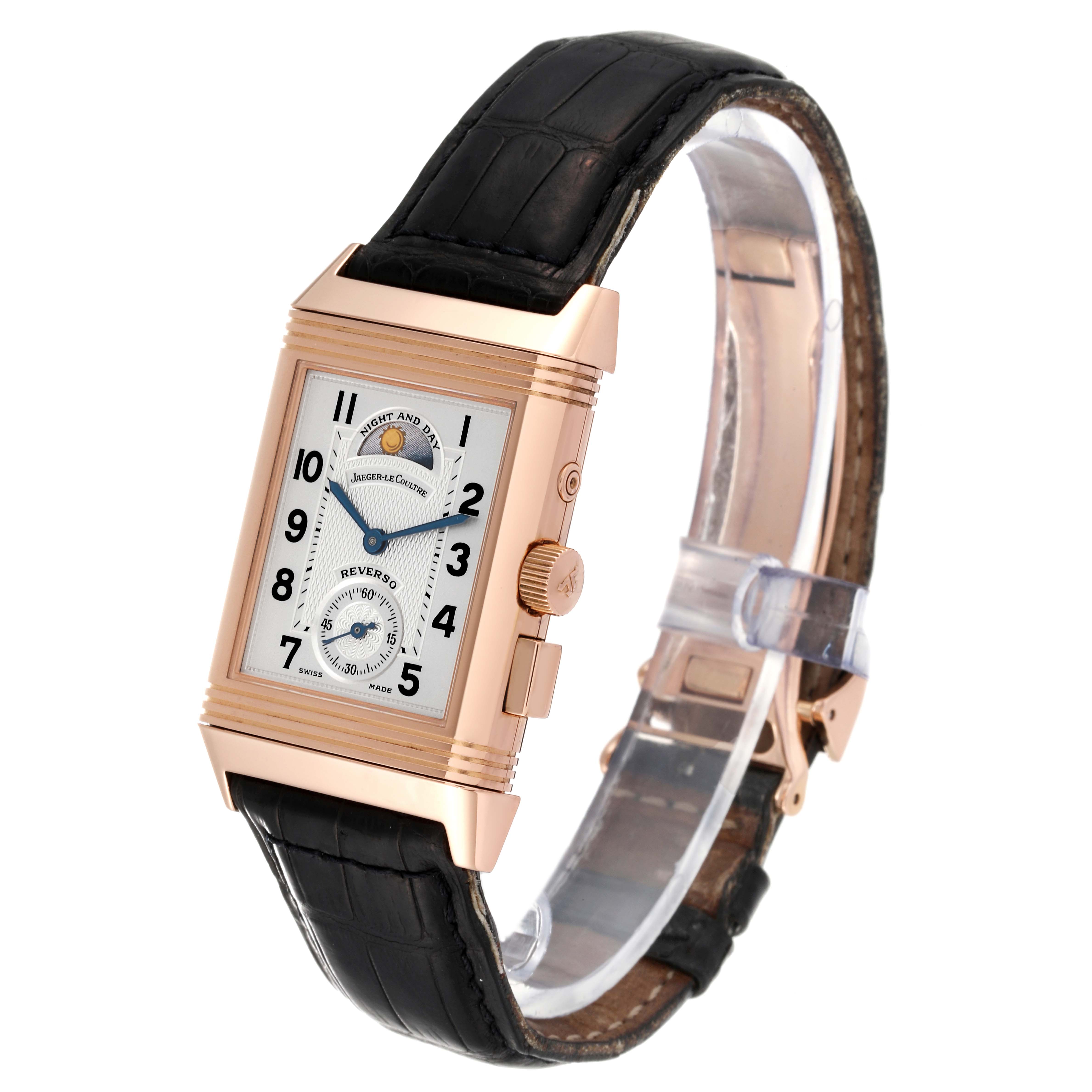 This image shows a Jaeger-LeCoultre Reverso watch, featuring a rectangular case, black leather strap, and visible crown.