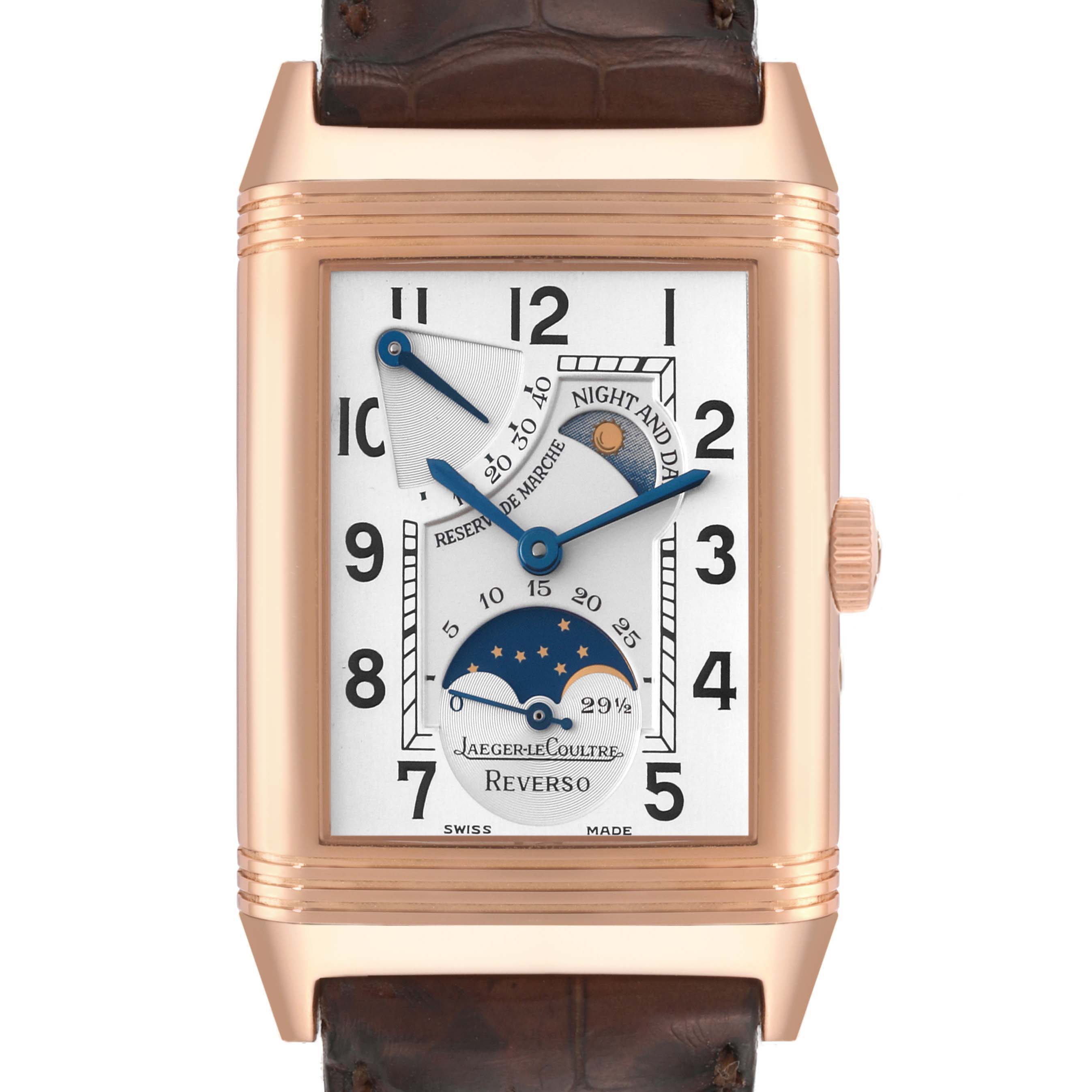 The image shows a front view of a Jaeger LeCoultre Reverso 270.2.63 Q2752420 Men
s Rose Gold Silver Dial 270.2.63 Q2752420 Men
s Rose Gold Silver Dial watch, displaying the dial with complications and brown leather strap.