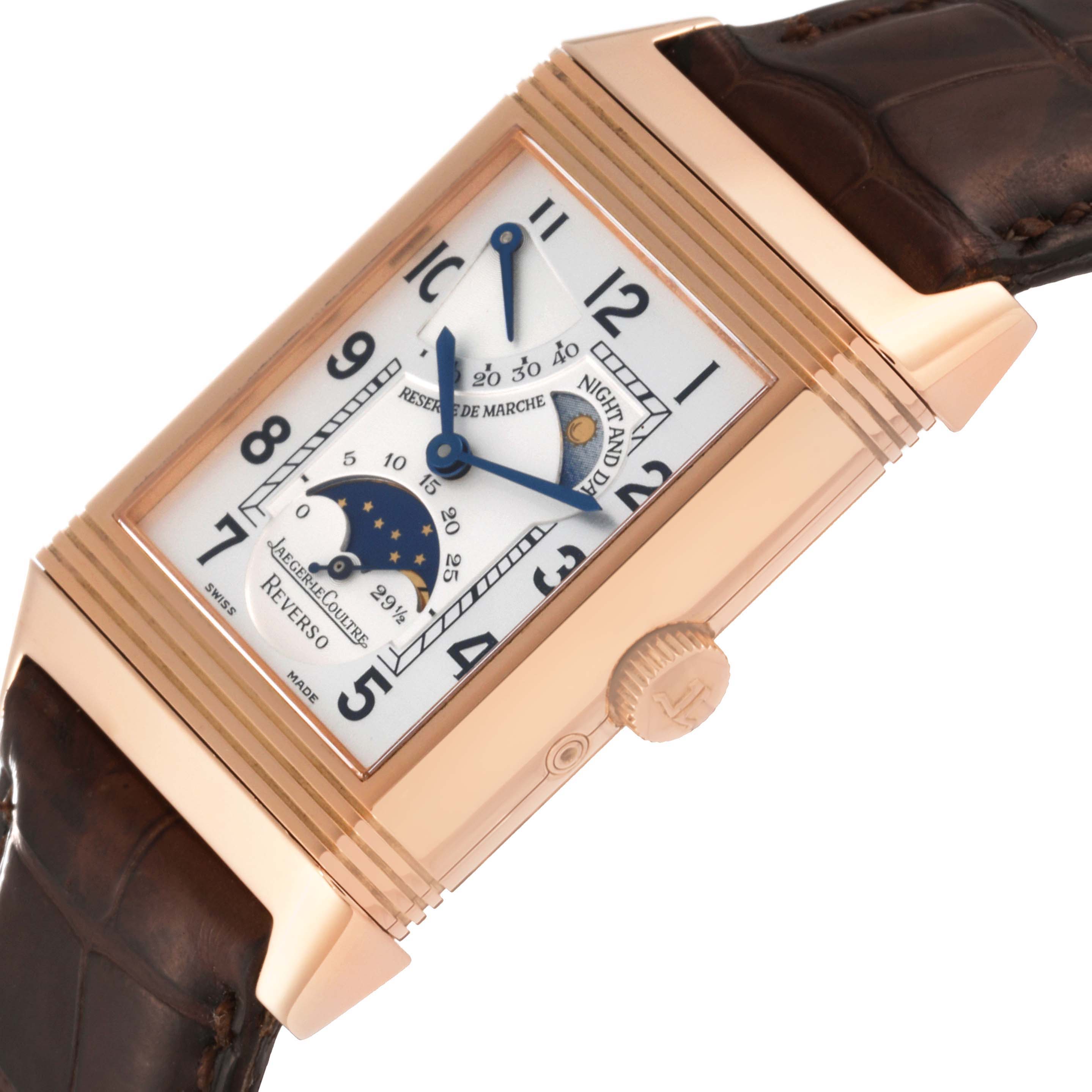 The image shows a Jaeger-LeCoultre Reverso watch angled to highlight its face, side crown, and leather strap.