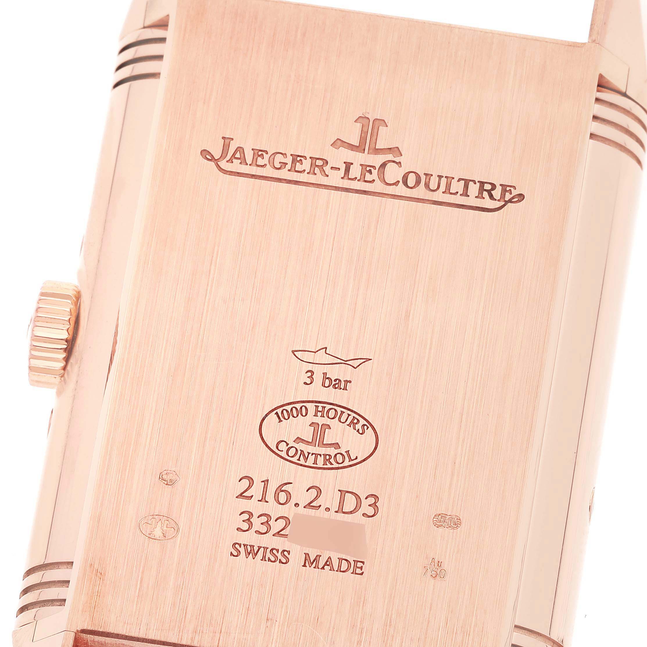 The image shows the case back of the Jaeger LeCoultre Reverso Q3912420 Men's Rose Gold Silver Dial Q3912420 Men's Rose Gold Silver Dial watch, displaying engravings and the crown on the side.