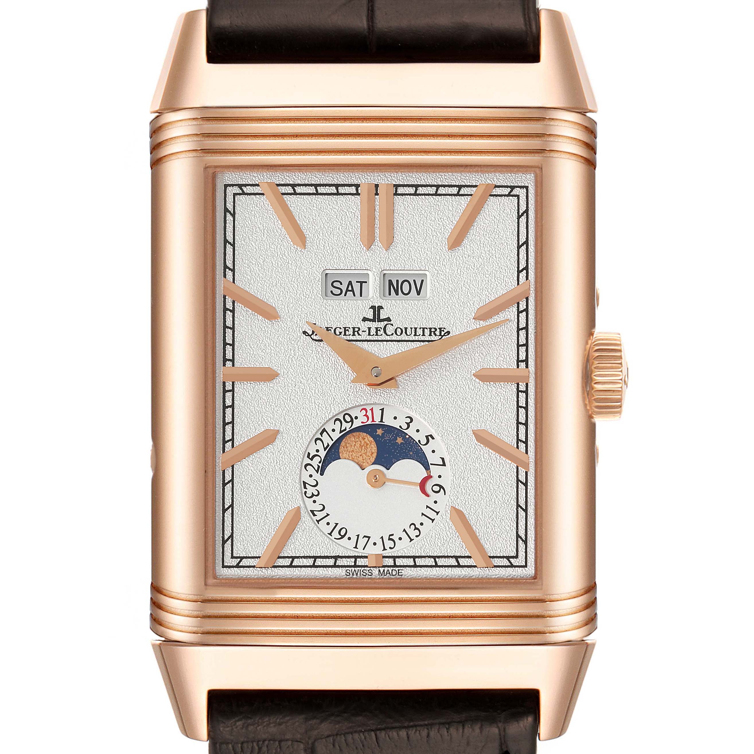 The image shows a Jaeger-LeCoultre Reverso watch from a front angle, highlighting the dial, hands, day, and month indicators.