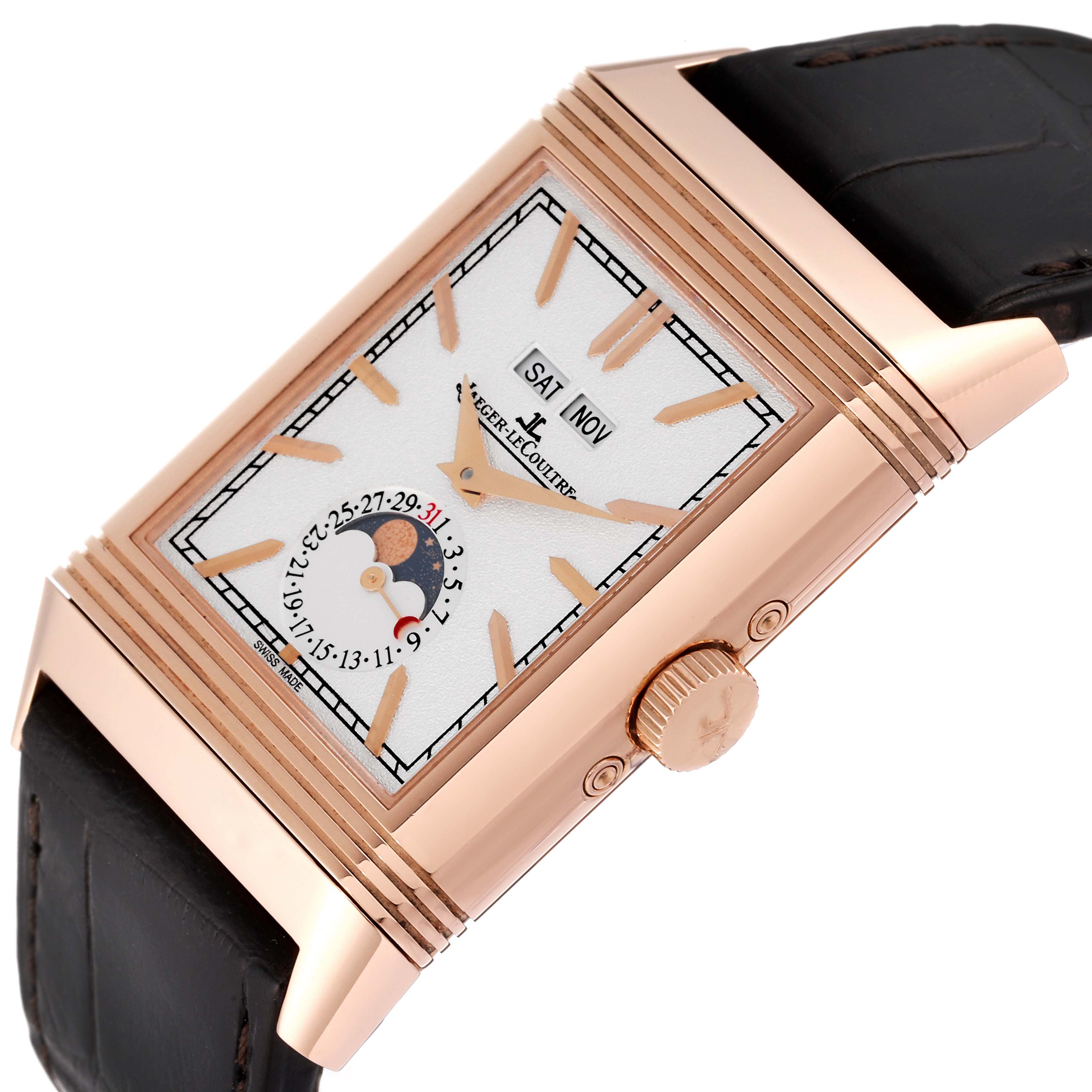 This image shows a close-up side view of a Jaeger LeCoultre Reverso Q3912420 Men's Rose Gold Silver Dial Q3912420 Men's Rose Gold Silver Dial watch, highlighting the dial, crown, and case.