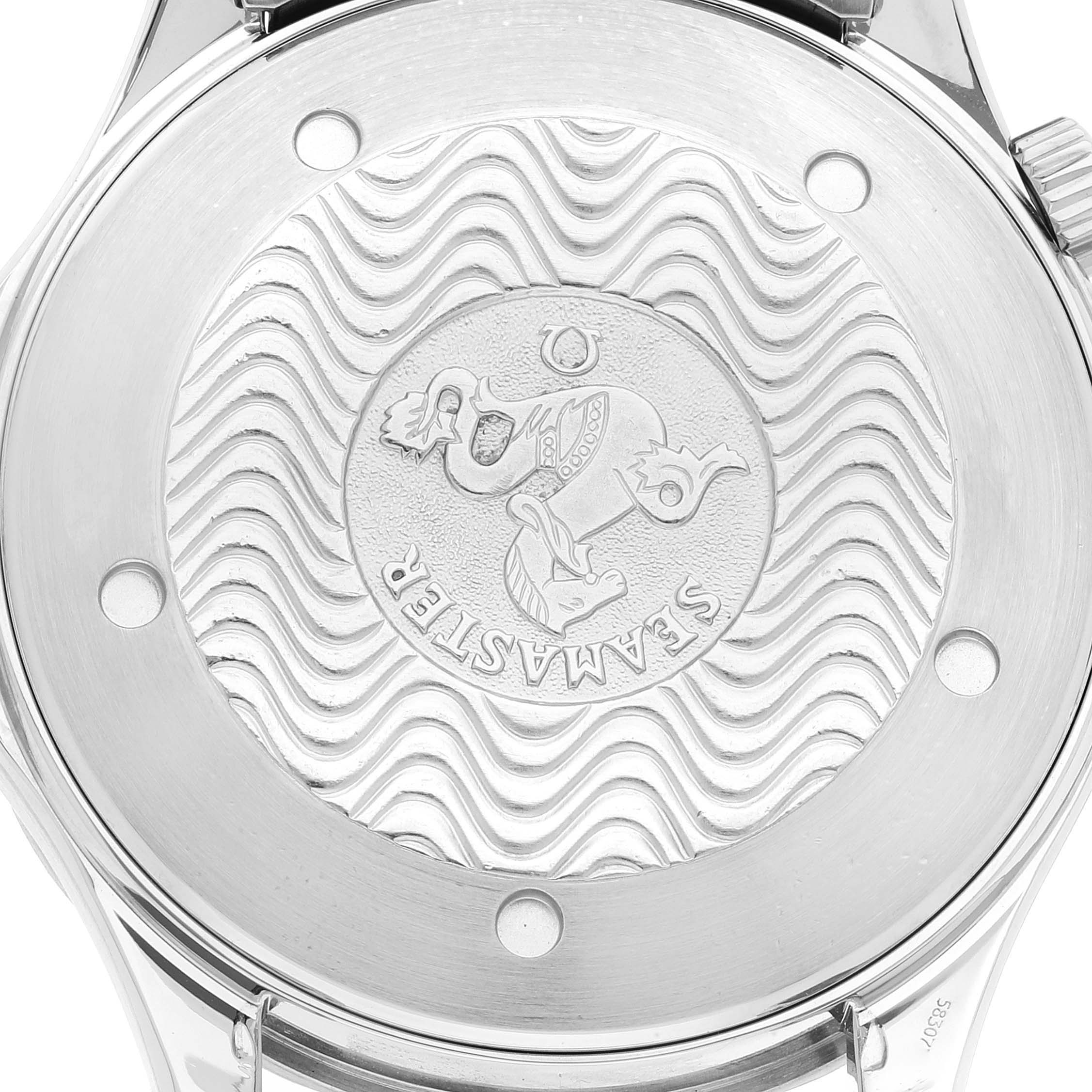 This image shows the case back of an Omega Seamaster 2265.80.00 Men's Stainless Steel Blue Dial 2265.80.00 Men's Stainless Steel Blue Dial watch featuring its embossed logo and wave pattern.