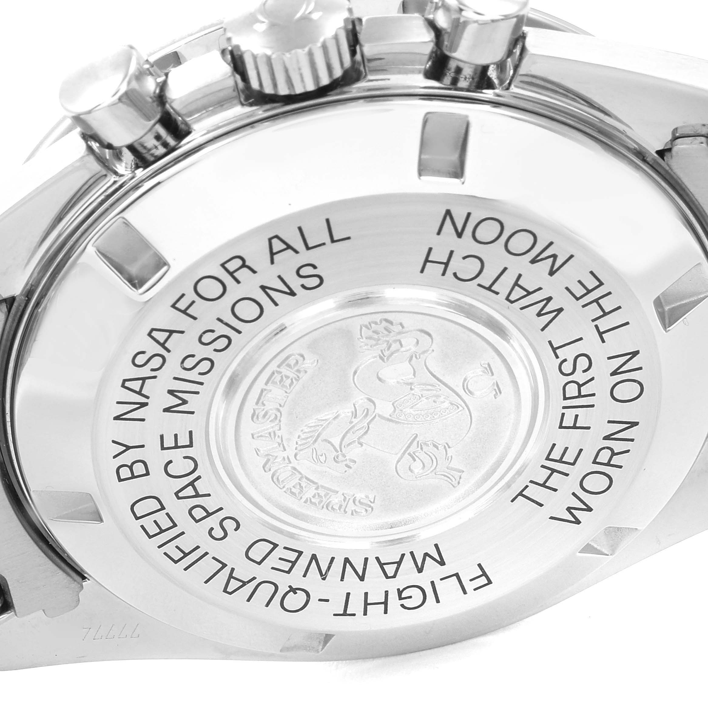 The image shows the case back and side view of an Omega Speedmaster 3570.50.00 Men's Stainless Steel Black Dial 3570.50.00 Men's Stainless Steel Black Dial watch, highlighting its engraved text and crown.