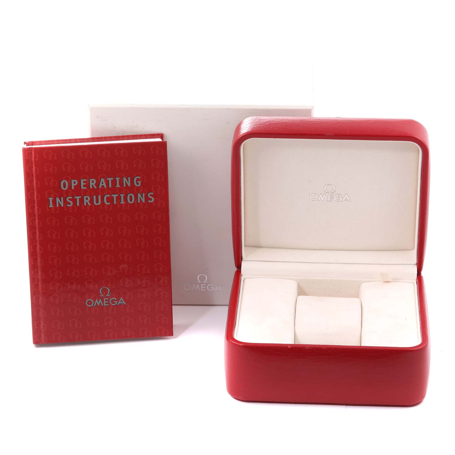 The image shows an Omega Speedmaster 3506.31.00 Men's Stainless Steel Silver Dial 3506.31.00 Men's Stainless Steel Silver Dial watch box and operating instructions from a front angle.