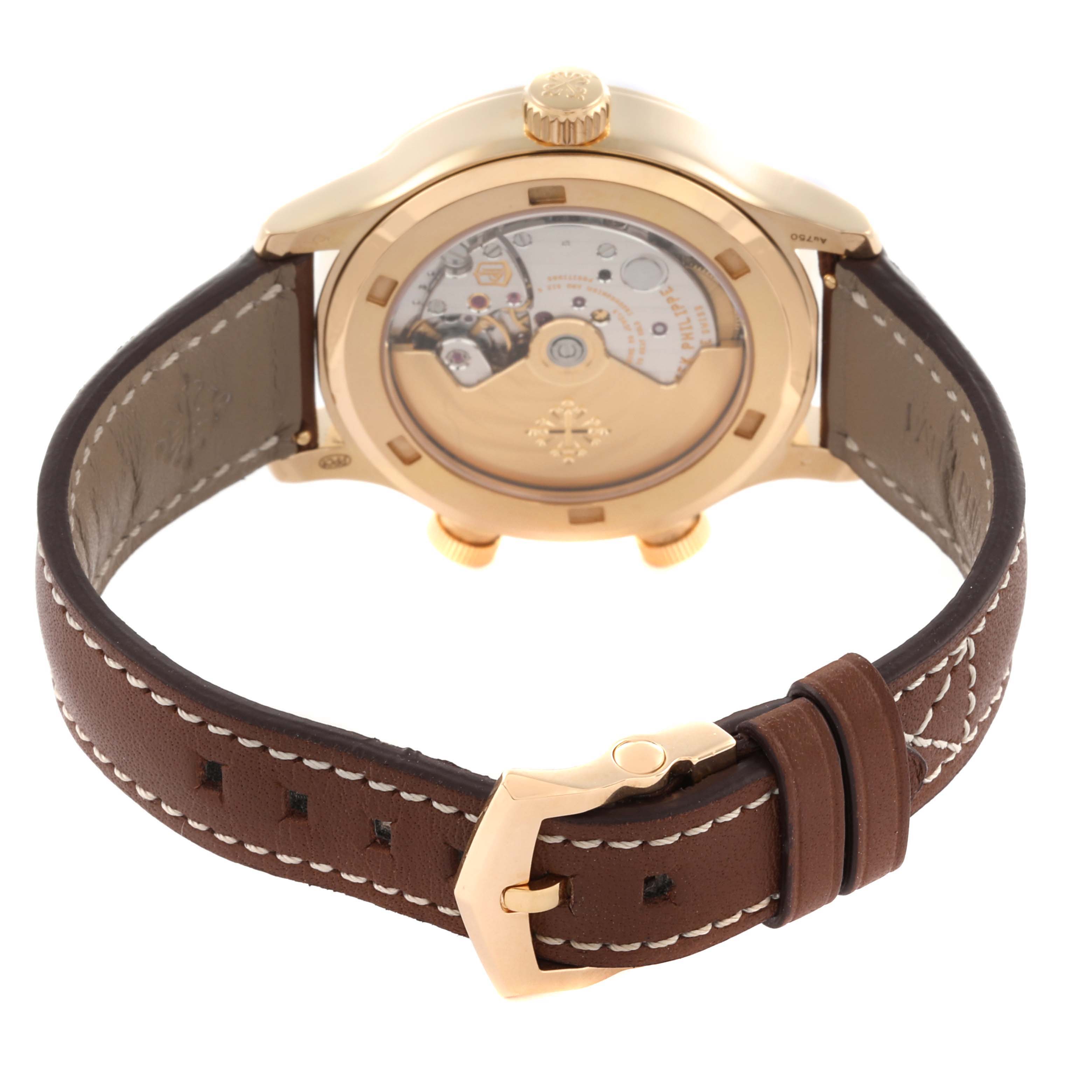The image shows the back view of a Patek Philippe Calatrava 7234R-001 Men's Rose Gold Brown Dial 7234R-001 Men's Rose Gold Brown Dial, highlighting the movement and leather strap.